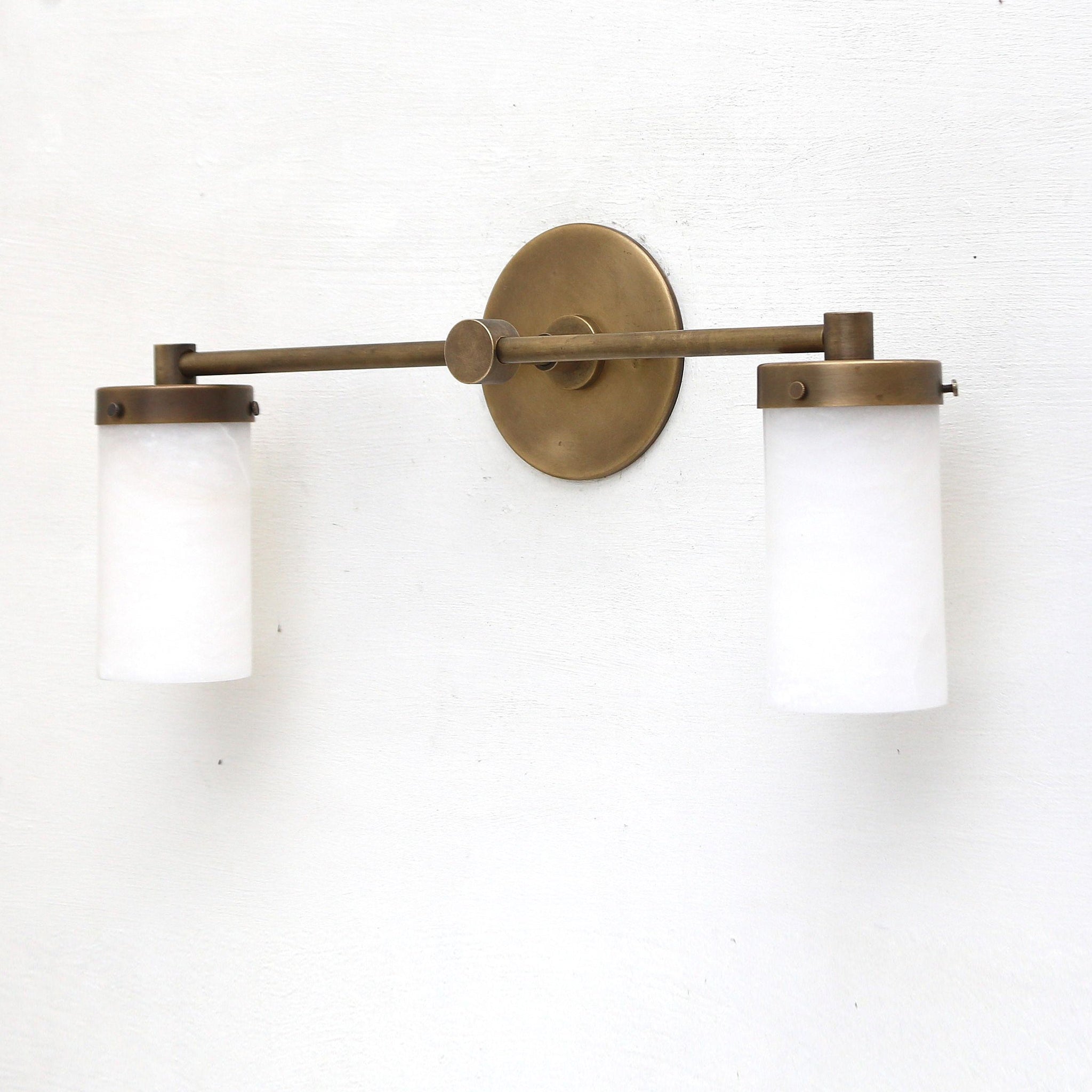 Two-Light Brass Wall Sconce with Alabaster Cylinders