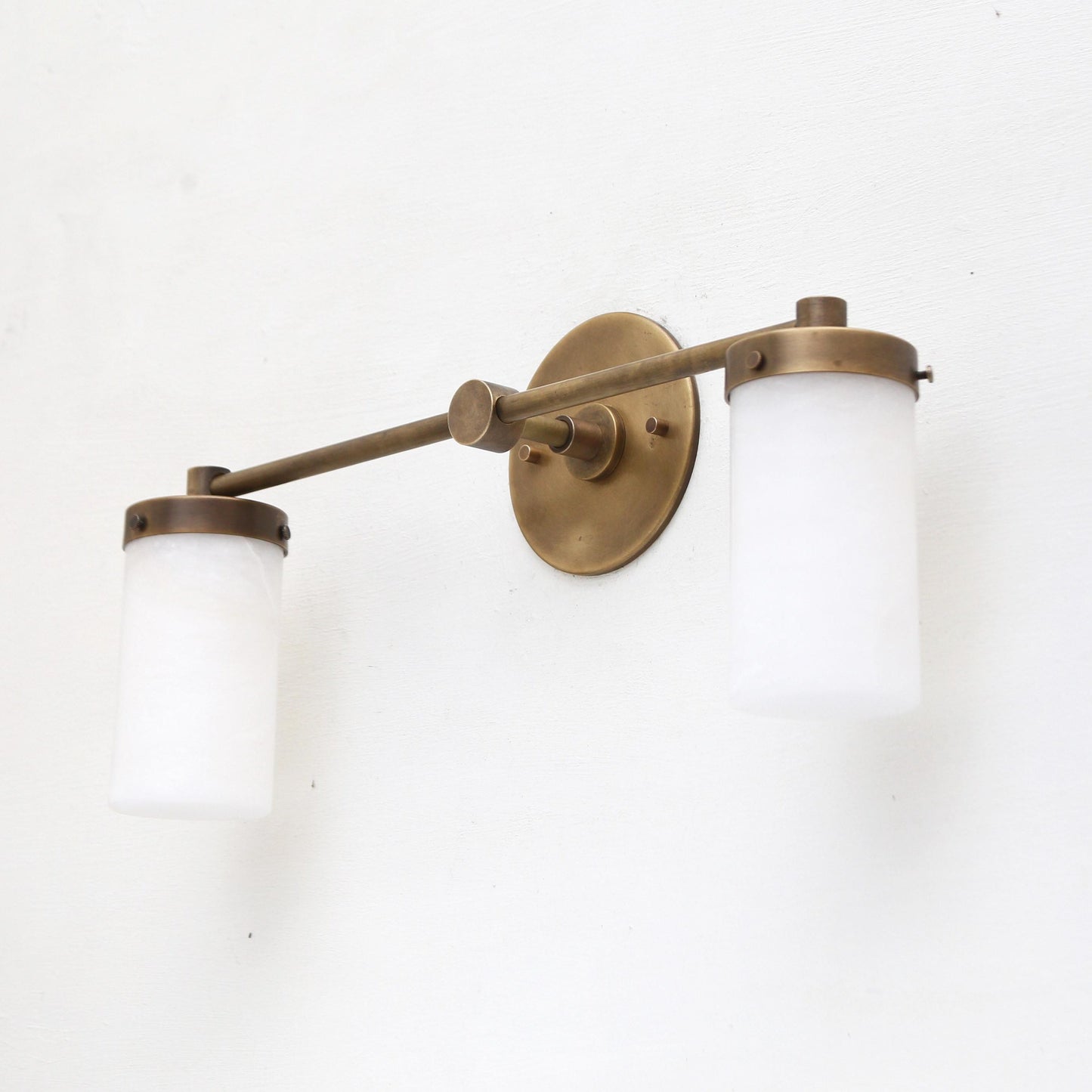 Two-Light Brass Wall Sconce with Alabaster Cylinders
