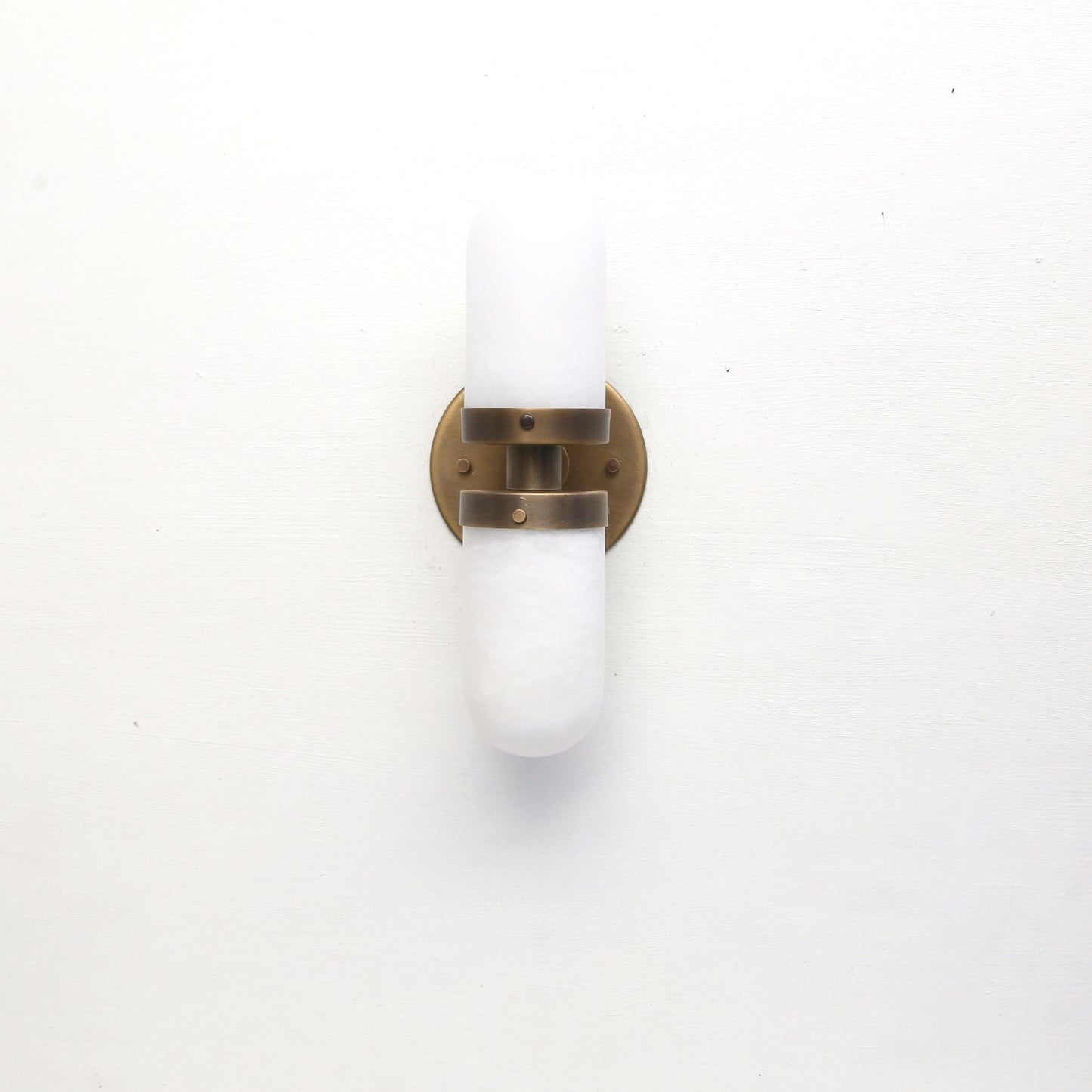 Two-Light Brass Wall Sconce with Clamped Alabaster Capsules