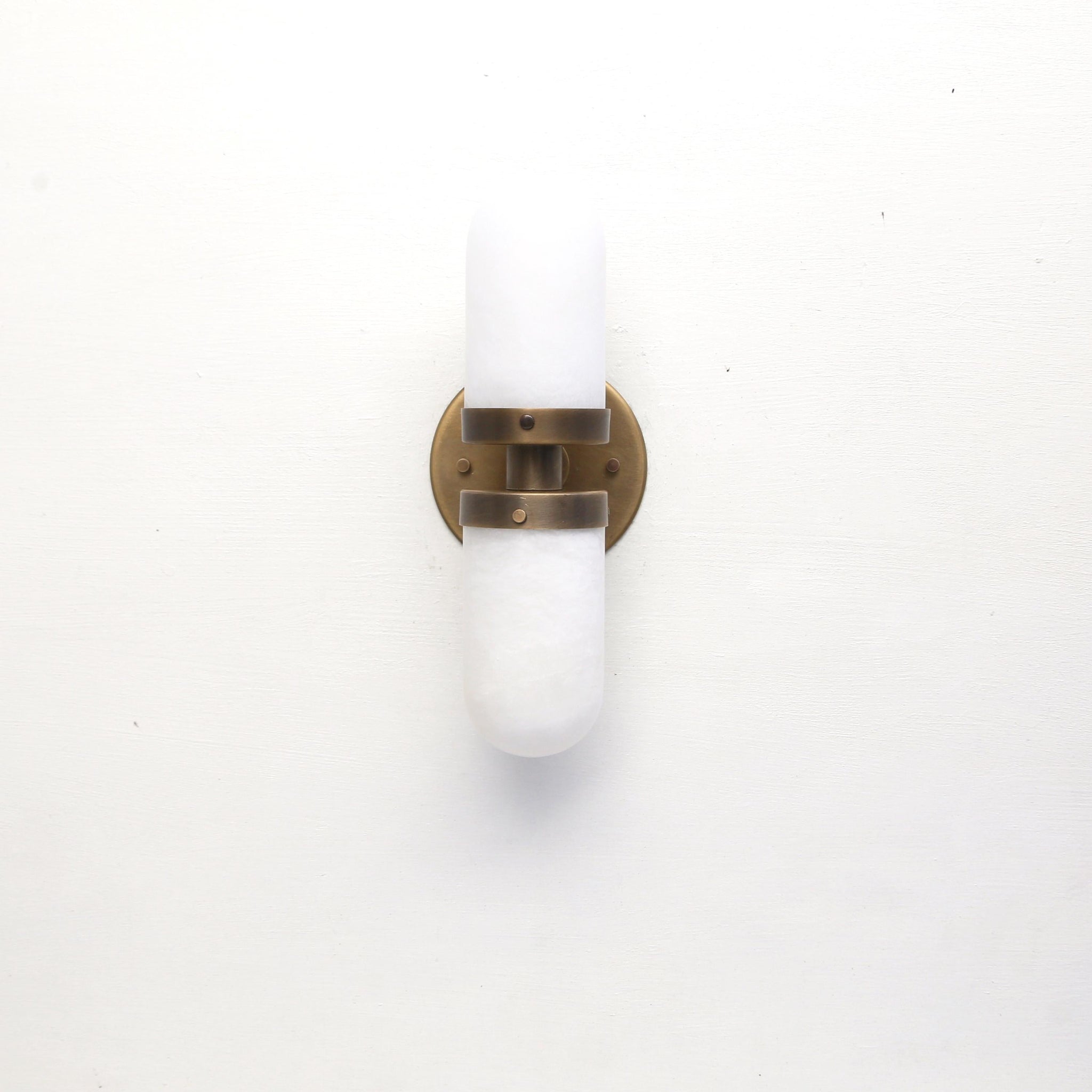 Two-Light Brass Wall Sconce with Clamped Alabaster Capsules