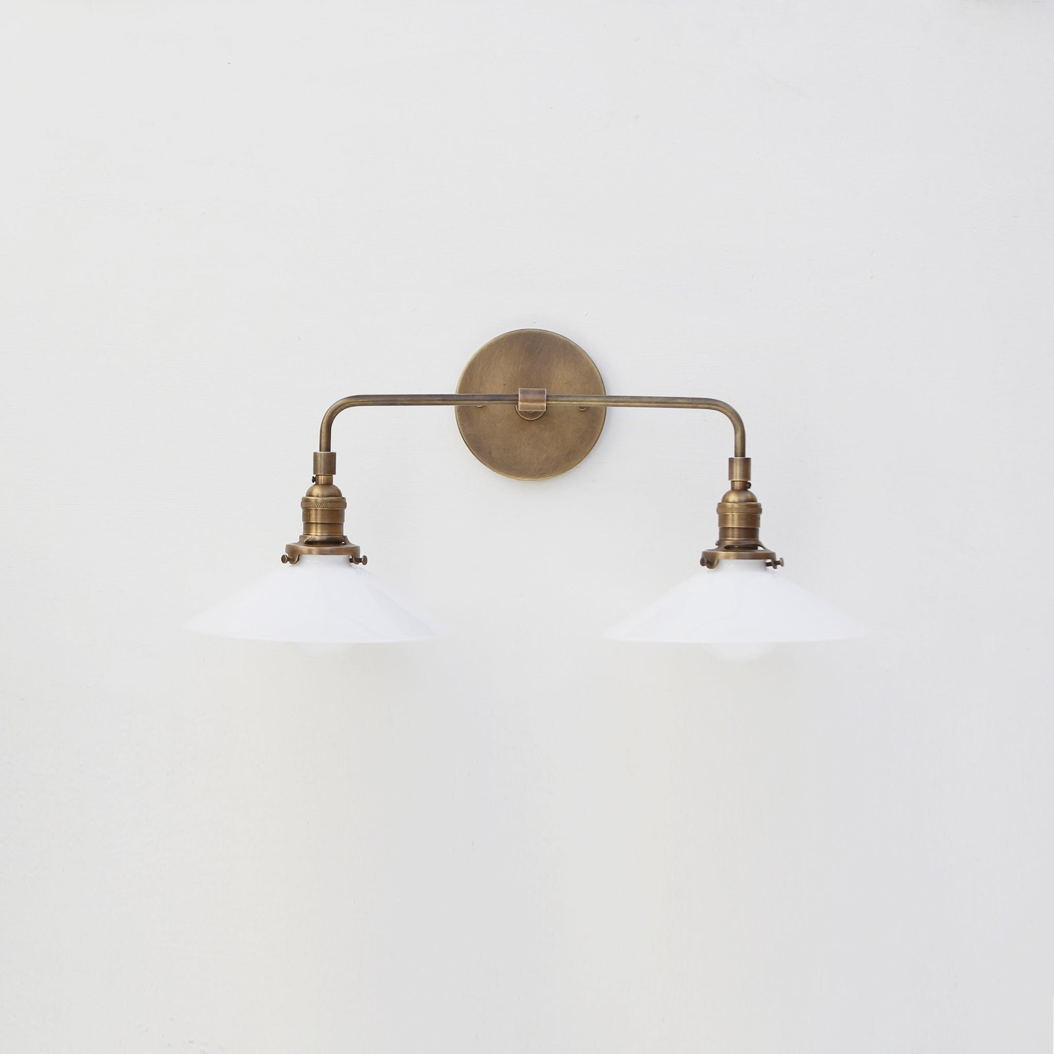 Two-Light Brass Wall Sconce with Opal Glass Cone Shades