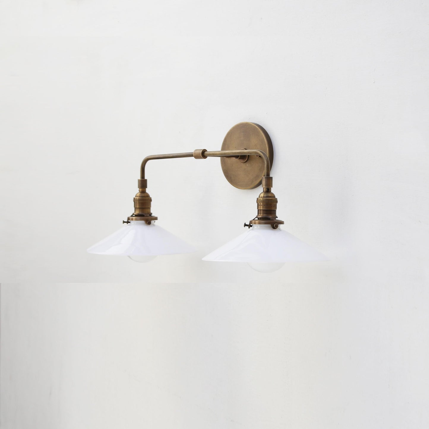 Two-Light Brass Wall Sconce with Opal Glass Cone Shades