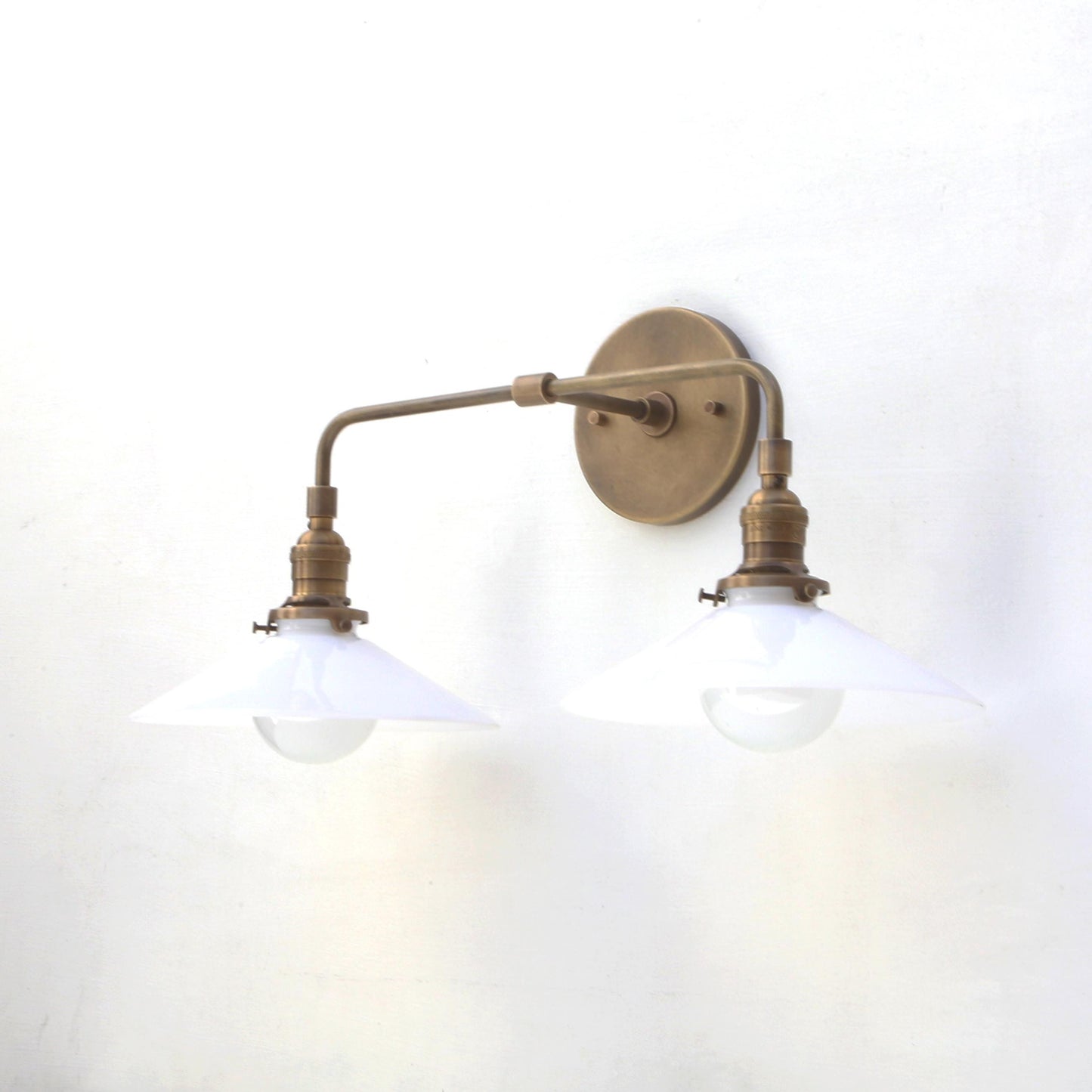 Two-Light Brass Wall Sconce with Opal Glass Cone Shades