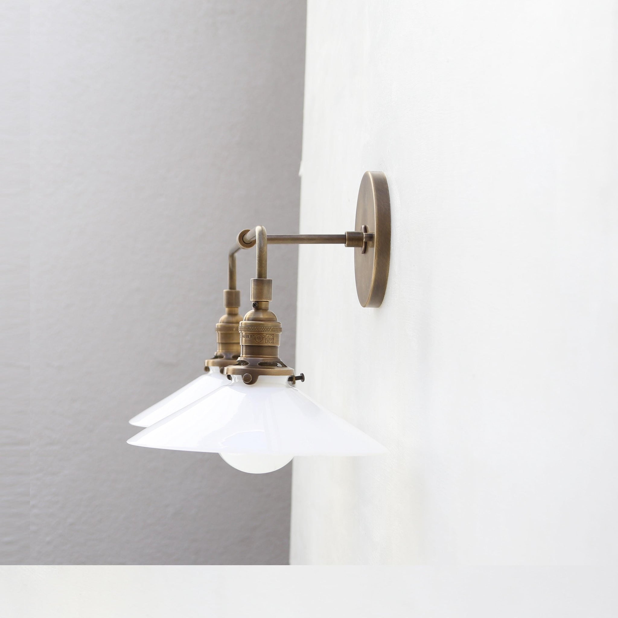 Two-Light Brass Wall Sconce with Opal Glass Cone Shades