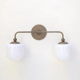 Two-Light Brass Wall Sconce with Opal Glass Globe Shades