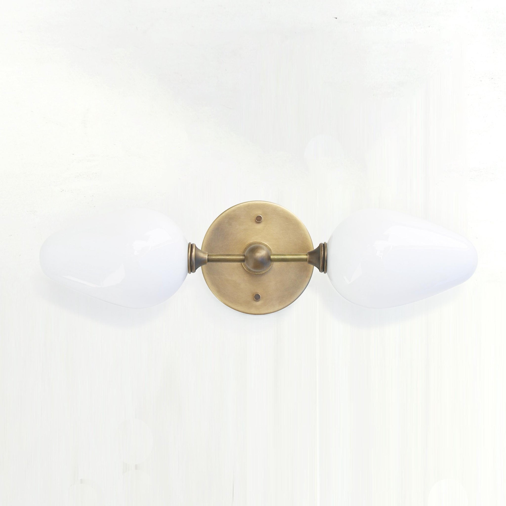 Two-Light Brass Wall Sconce with Opal Tulip Shades