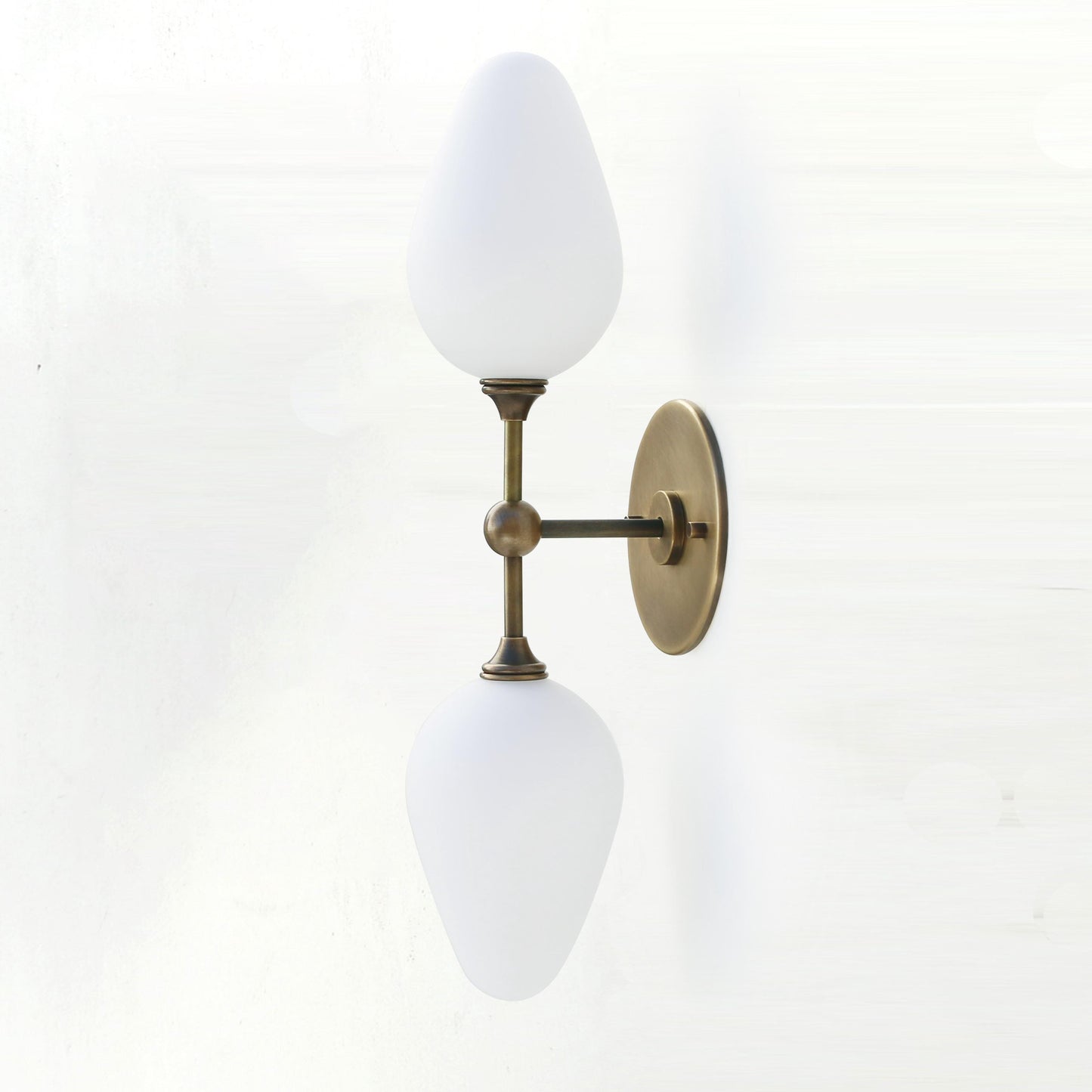Two-Light Brass Wall Sconce with Opal Tulip Shades