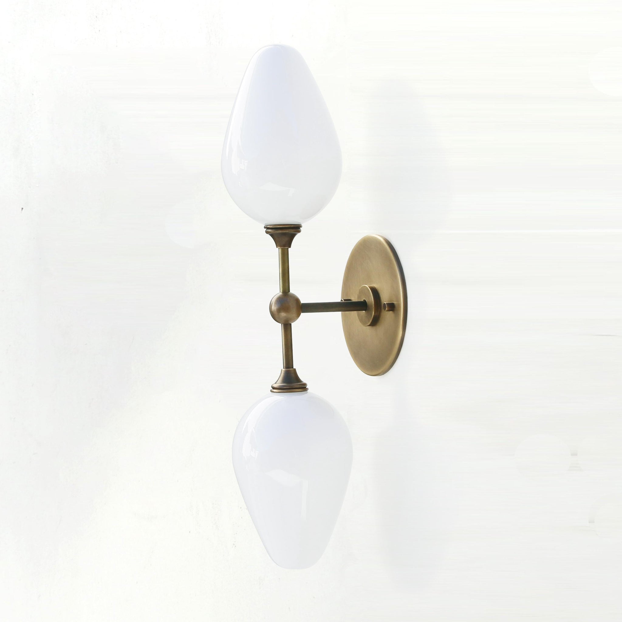 Two-Light Brass Wall Sconce with Opal Tulip Shades