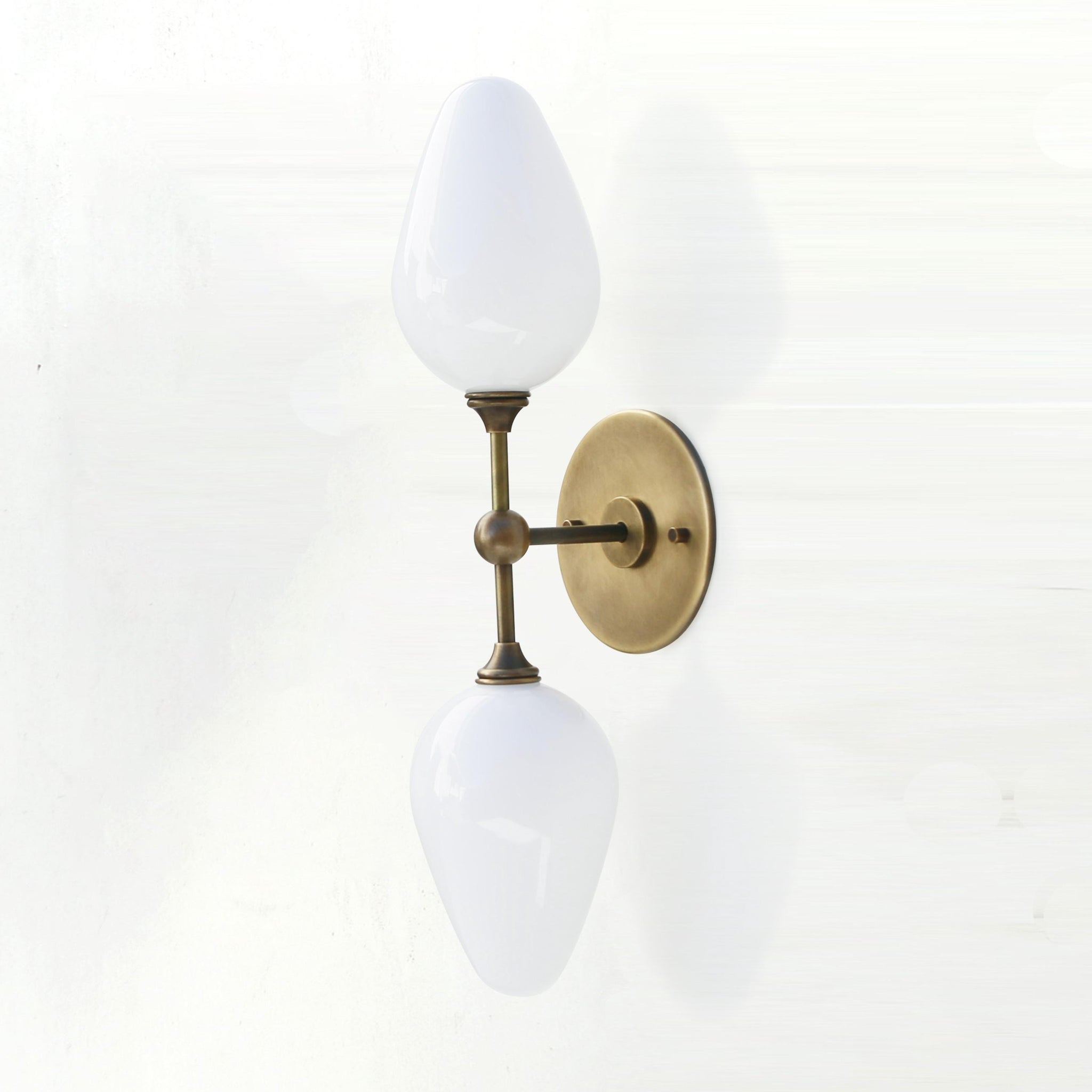 Two-Light Brass Wall Sconce with Opal Tulip Shades