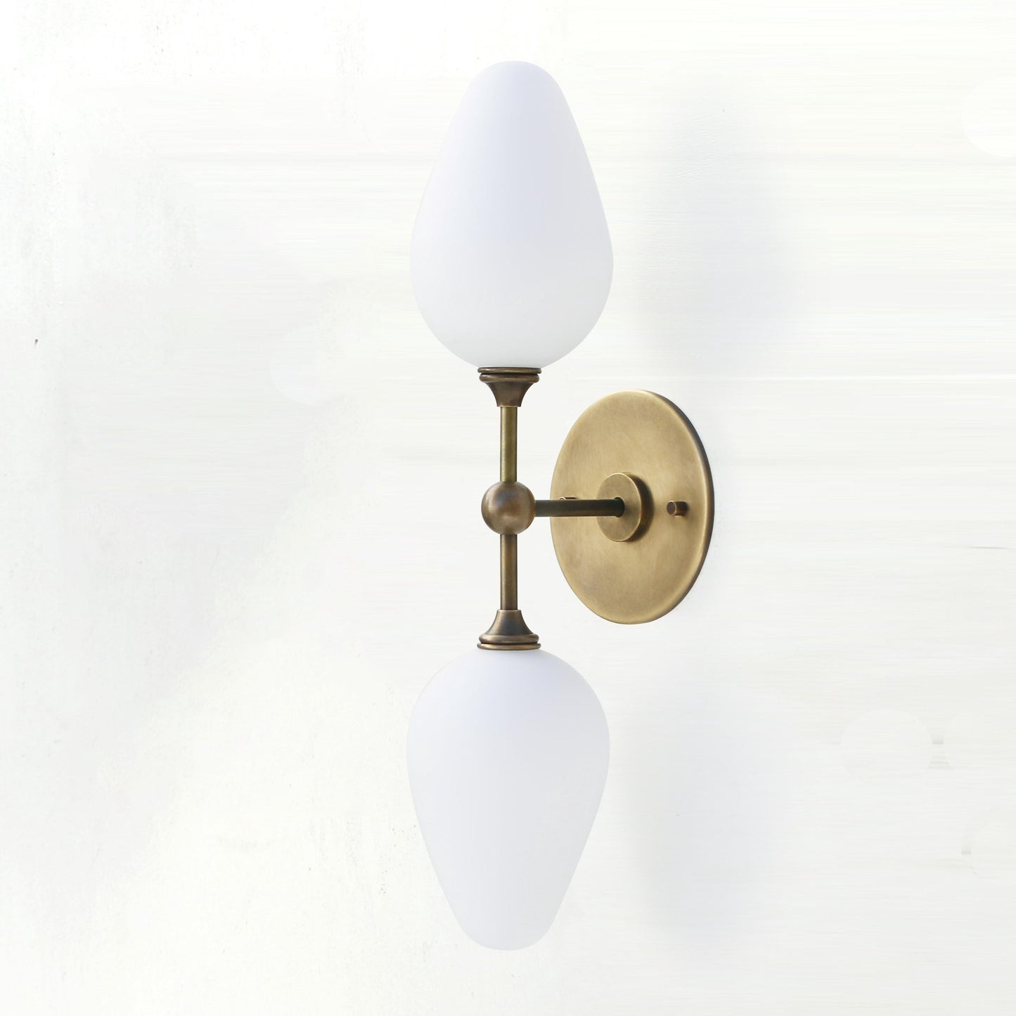 Two-Light Brass Wall Sconce with Opal Tulip Shades