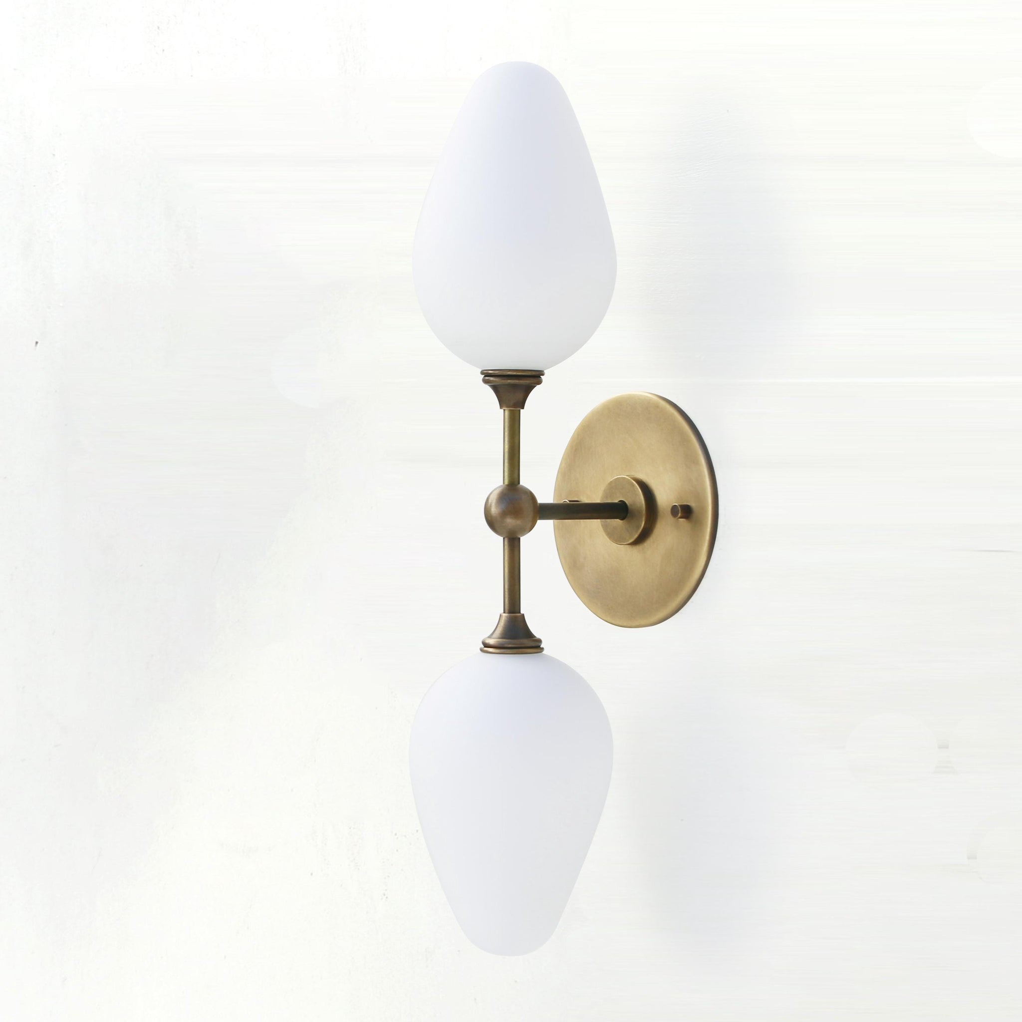 Two-Light Brass Wall Sconce with Opal Tulip Shades
