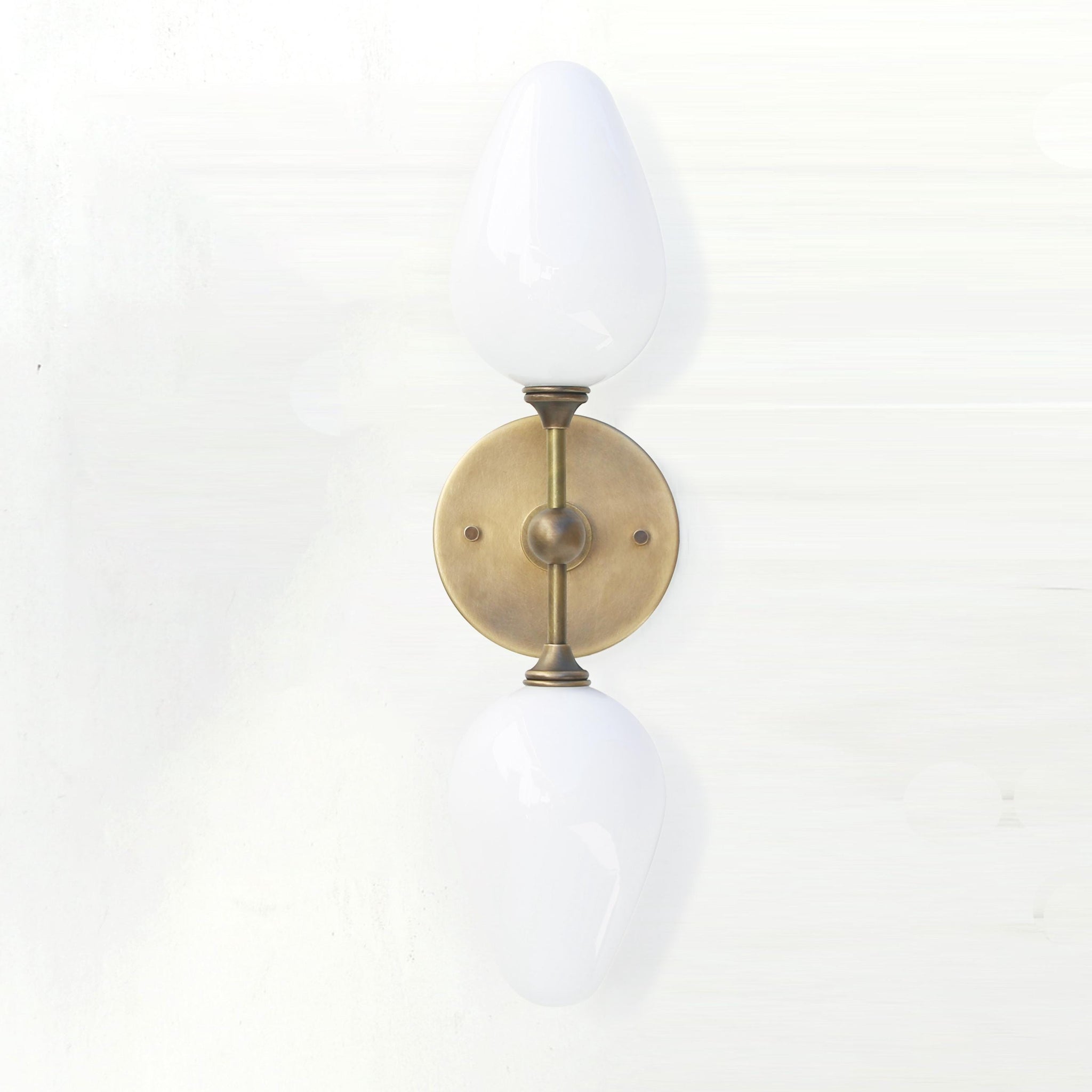 Two-Light Brass Wall Sconce with Opal Tulip Shades