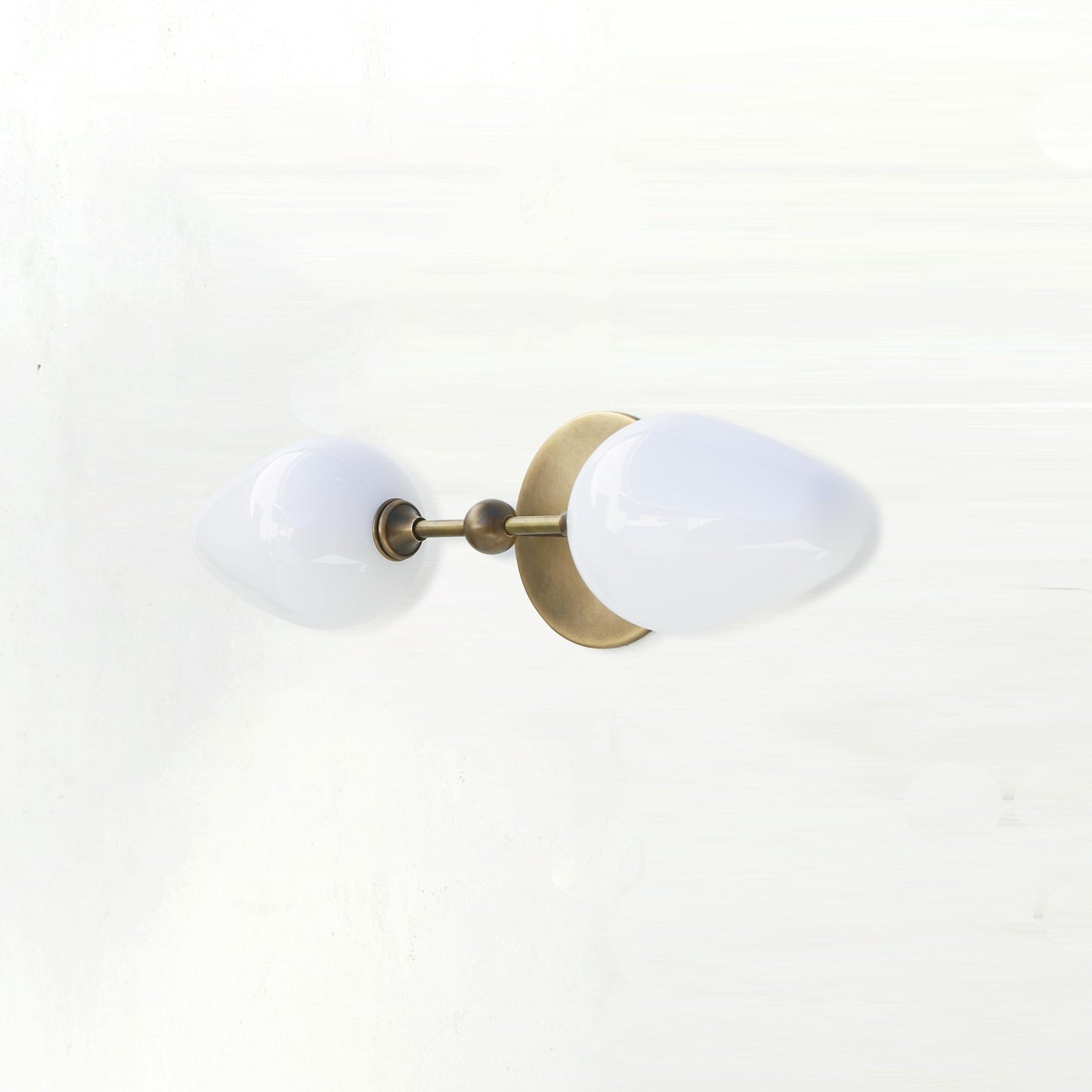 Two-Light Brass Wall Sconce with Opal Tulip Shades