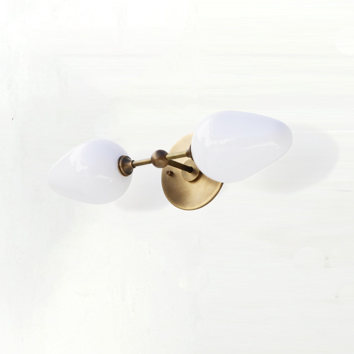 Two-Light Brass Wall Sconce with Opal Tulip Shades