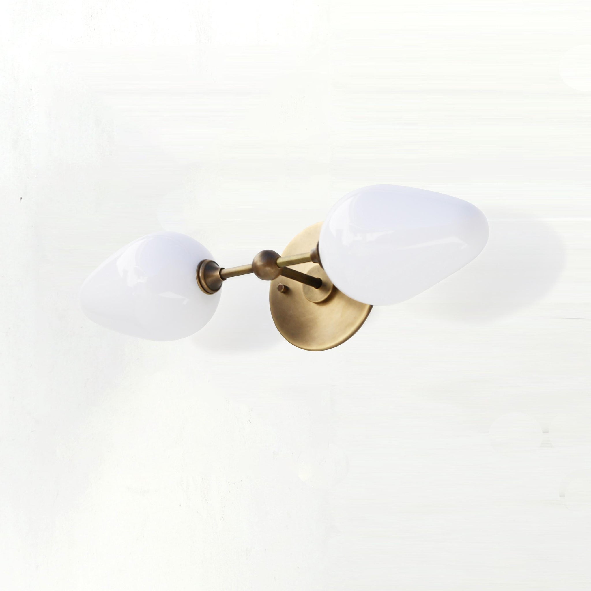 Two-Light Brass Wall Sconce with Opal Tulip Shades