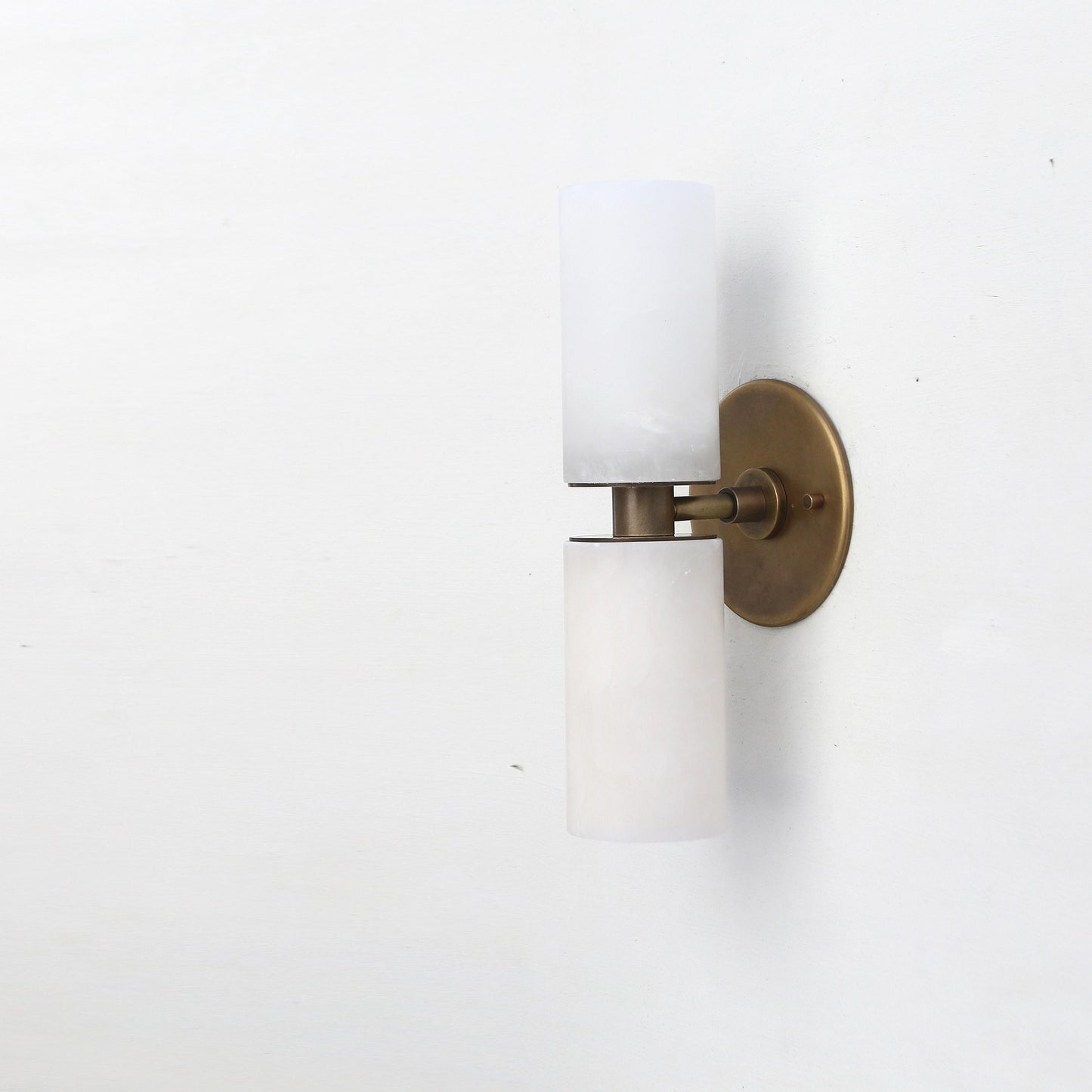 Two-Light Brass Wall Sconce with Stacked Alabaster Cylinders