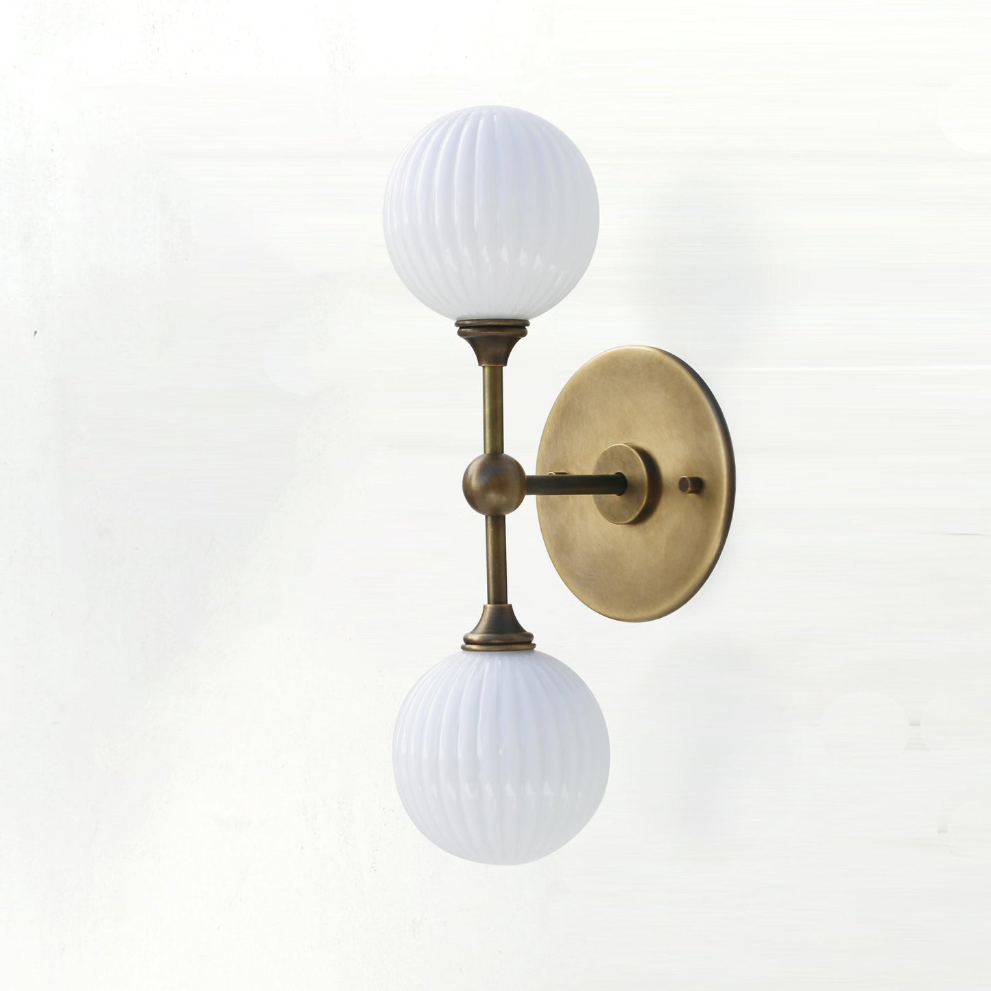 Two-Light Brass Wall Sconce with Stacked Ribbed Opal Globes