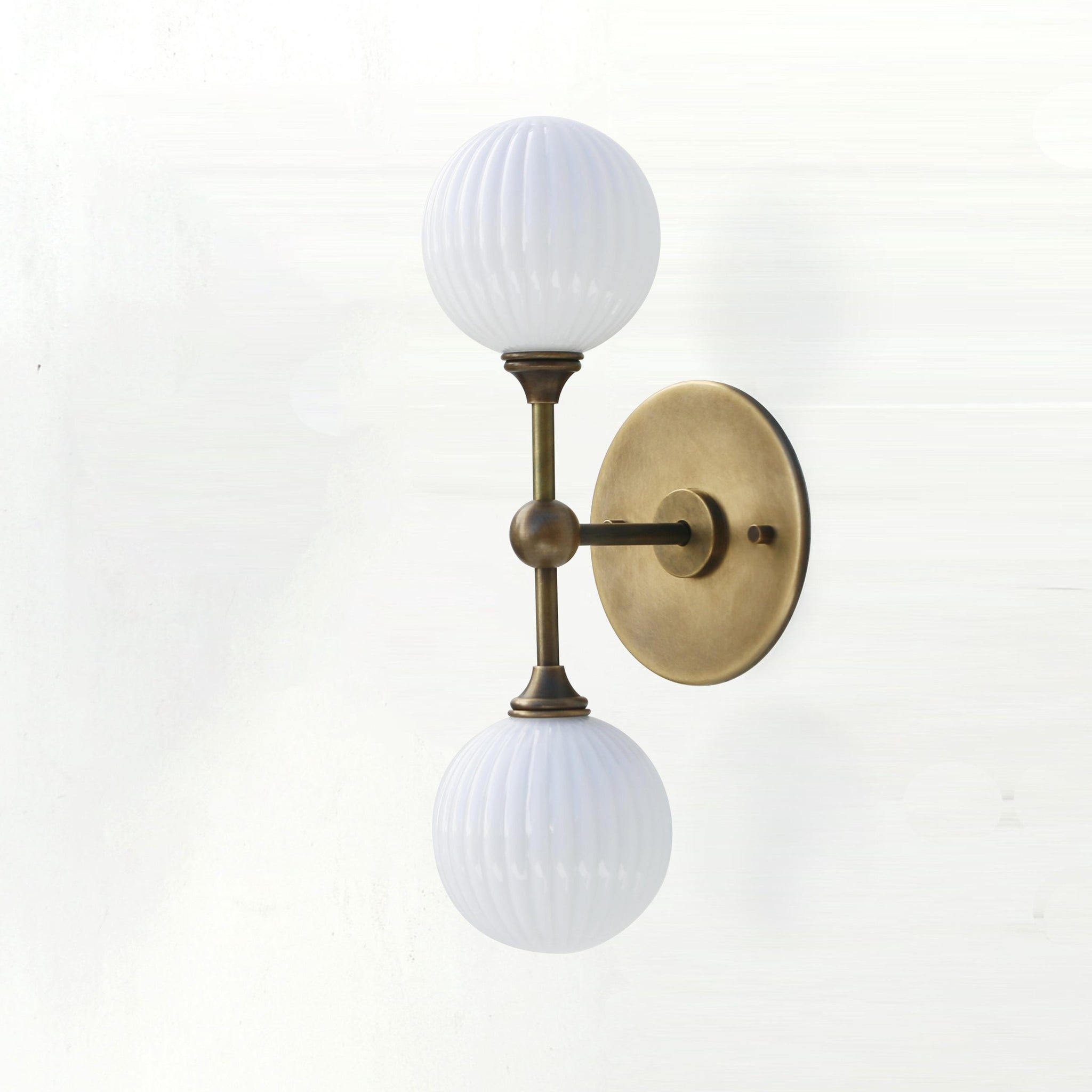 Two-Light Brass Wall Sconce with Stacked Ribbed Opal Globes