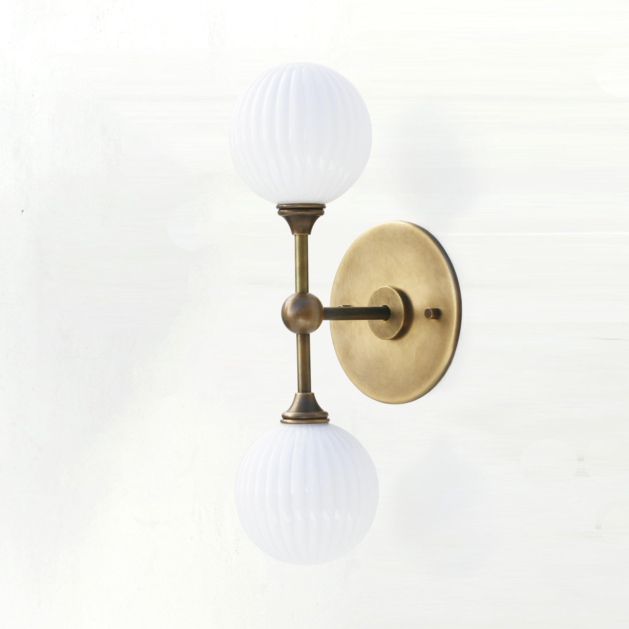Two-Light Brass Wall Sconce with Stacked Ribbed Opal Globes
