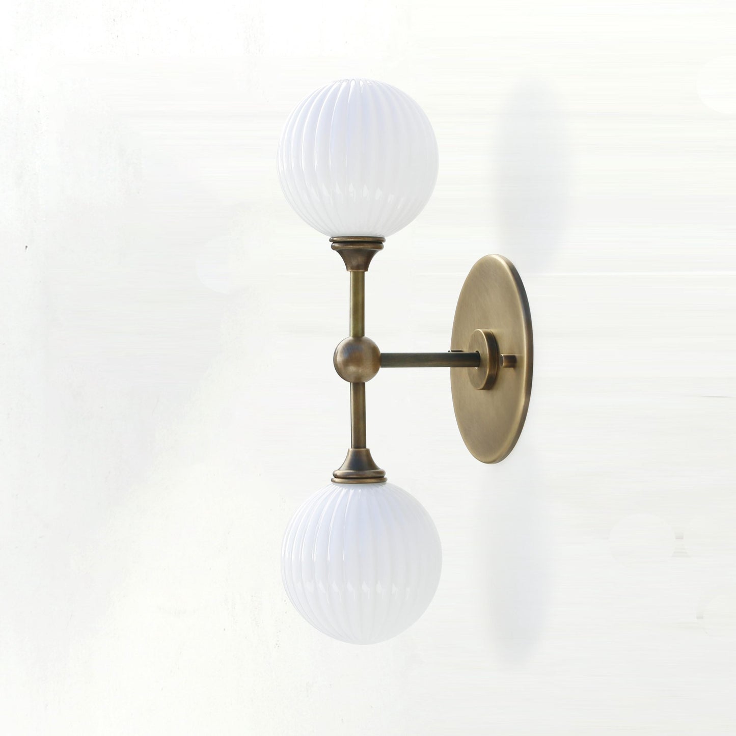 Two-Light Brass Wall Sconce with Stacked Ribbed Opal Globes
