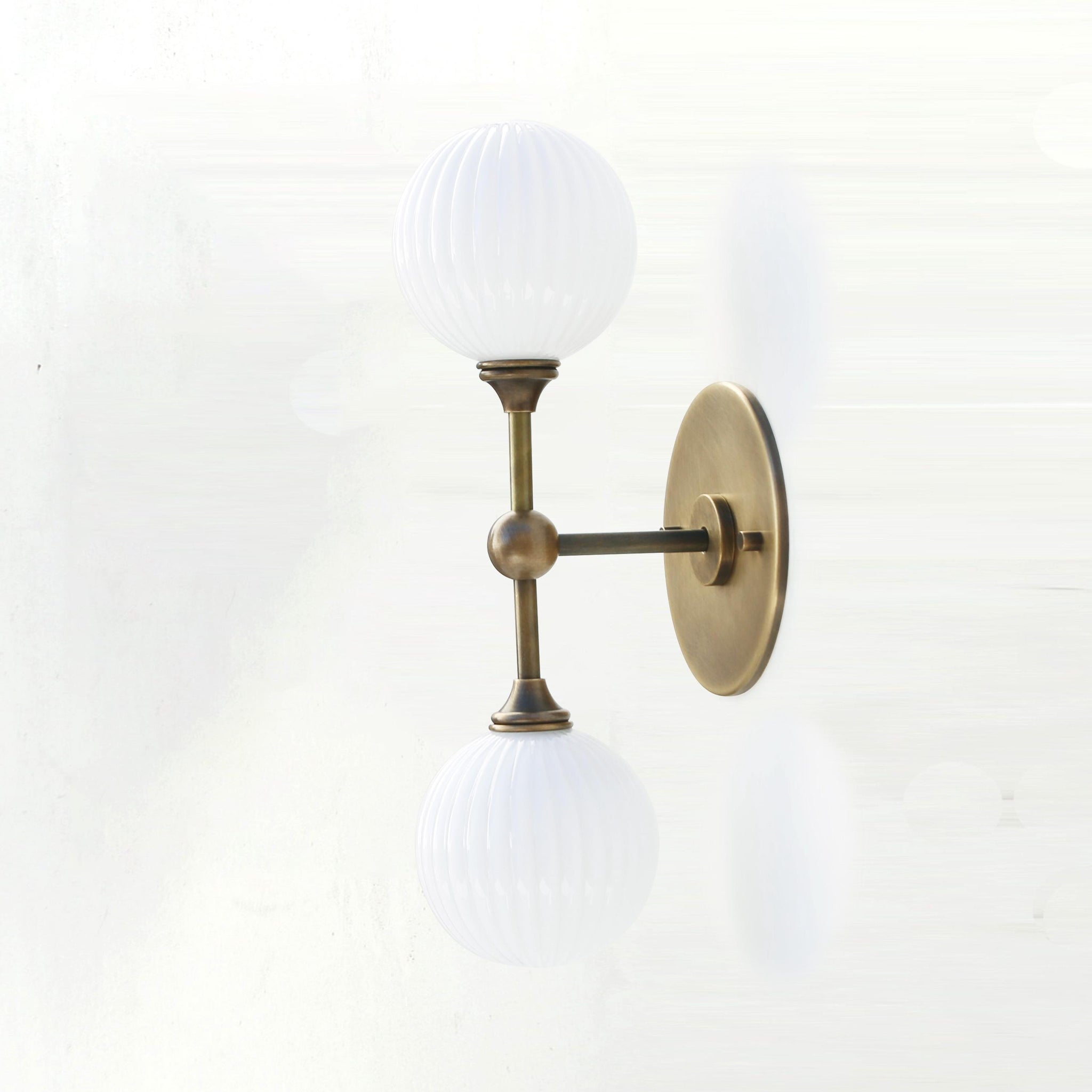 Two-Light Brass Wall Sconce with Stacked Ribbed Opal Globes