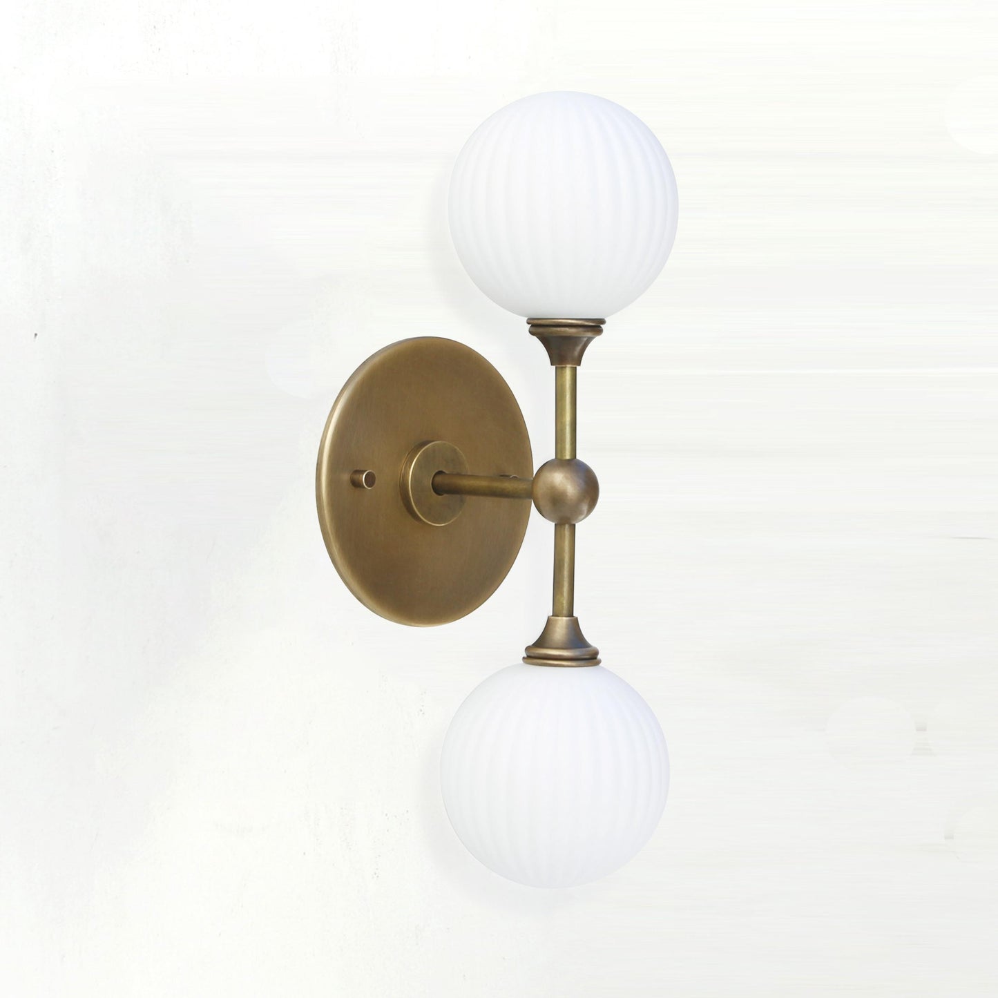 Two-Light Brass Wall Sconce with Stacked Ribbed Opal Globes
