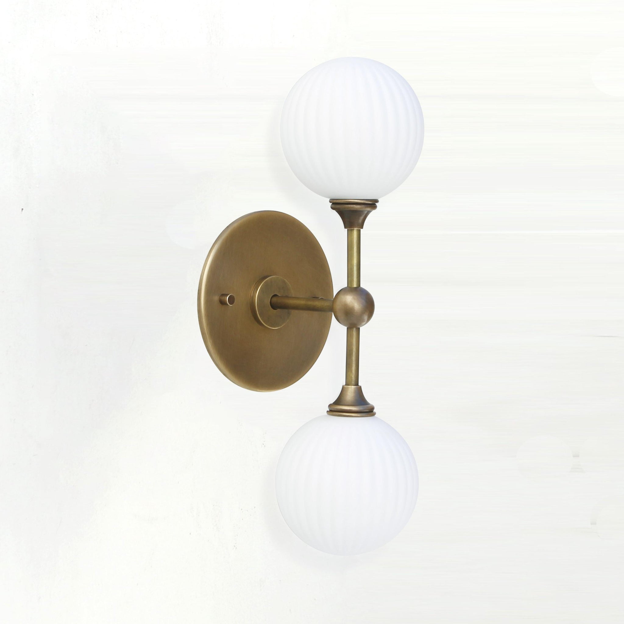 Two-Light Brass Wall Sconce with Stacked Ribbed Opal Globes