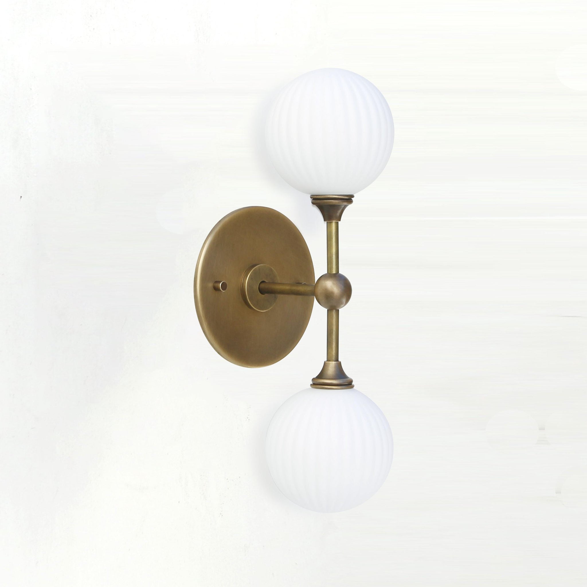 Two-Light Brass Wall Sconce with Stacked Ribbed Opal Globes