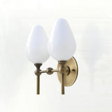 Two-Light Brass Wall Sconce with Upward Opal Tulip Shades