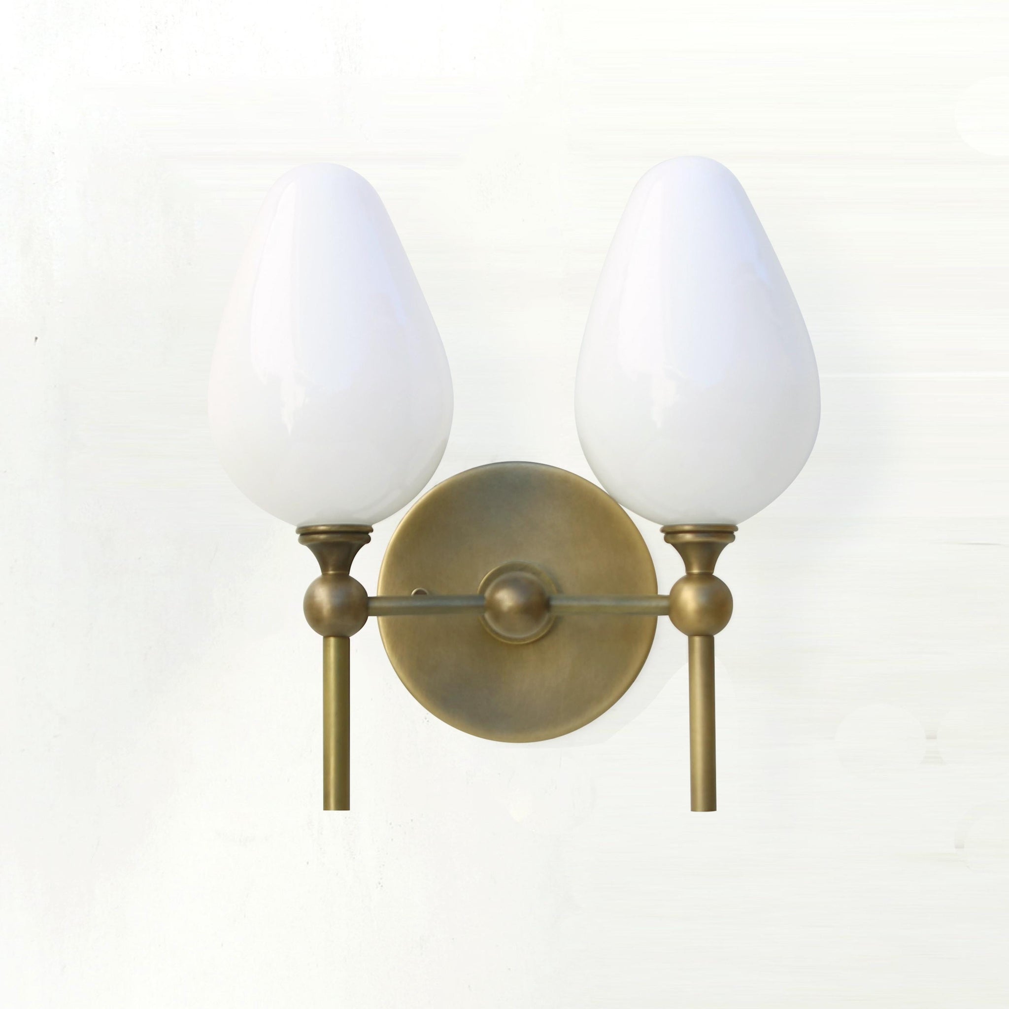 Two-Light Brass Wall Sconce with Upward Opal Tulip Shades