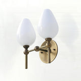Two-Light Brass Wall Sconce with Upward Opal Tulip Shades