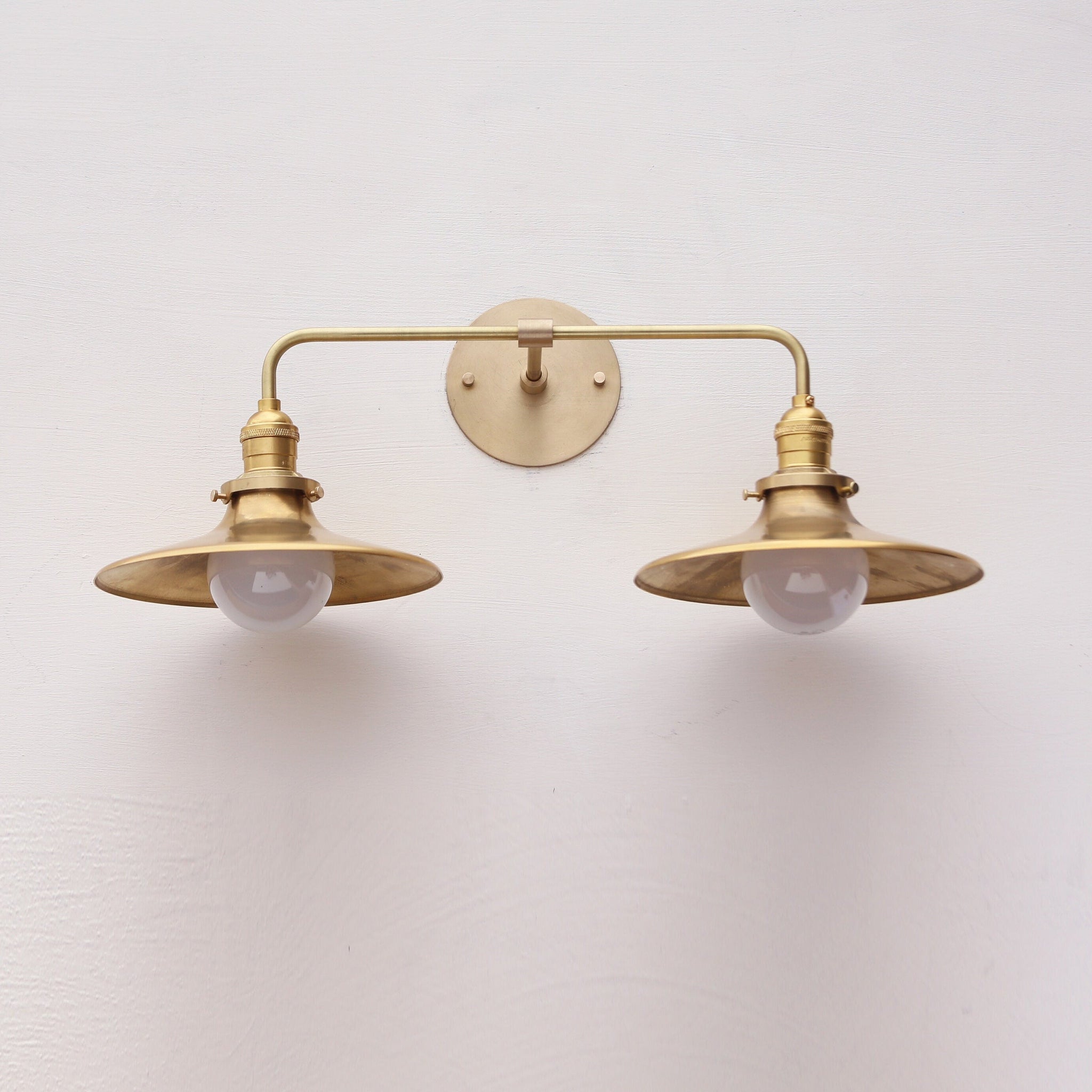 Two-Light Brass Wall Sconce with Wide Coolie Shades