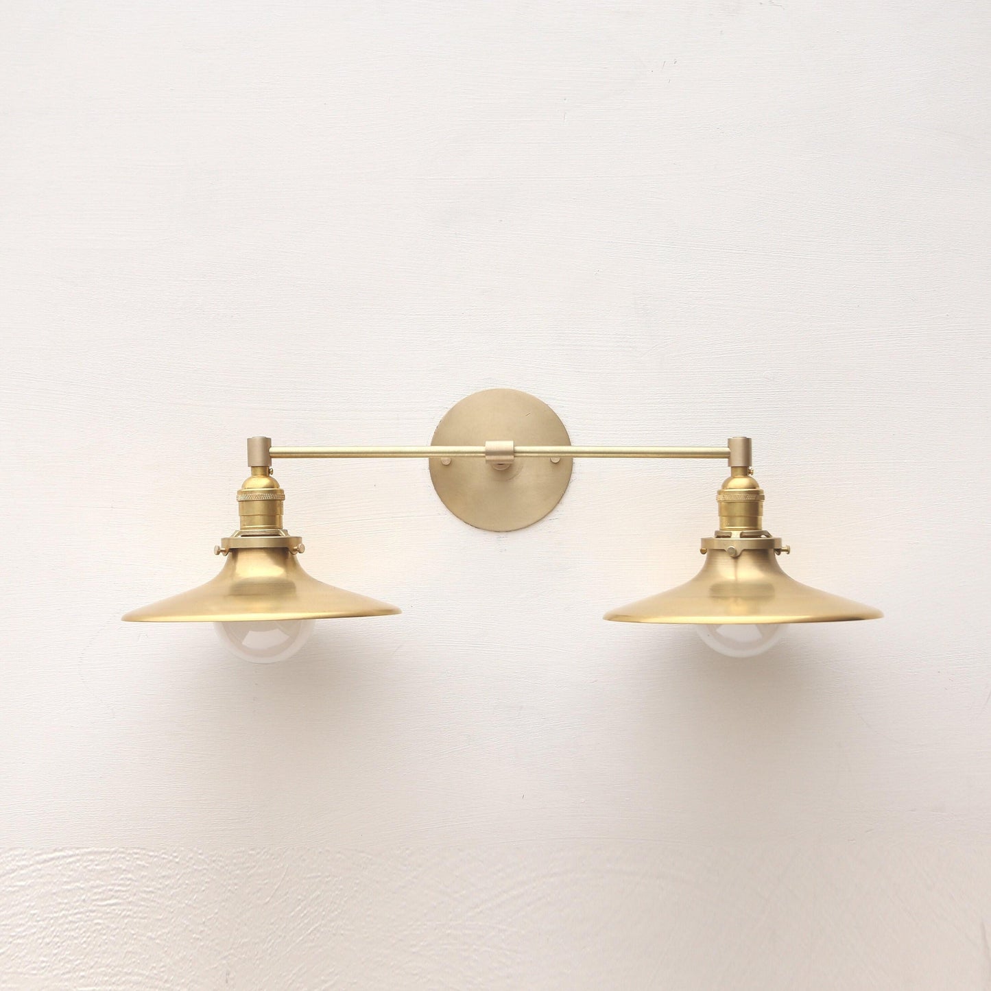 Two-Light Brass Wall Sconce with Wide Saucer Shades