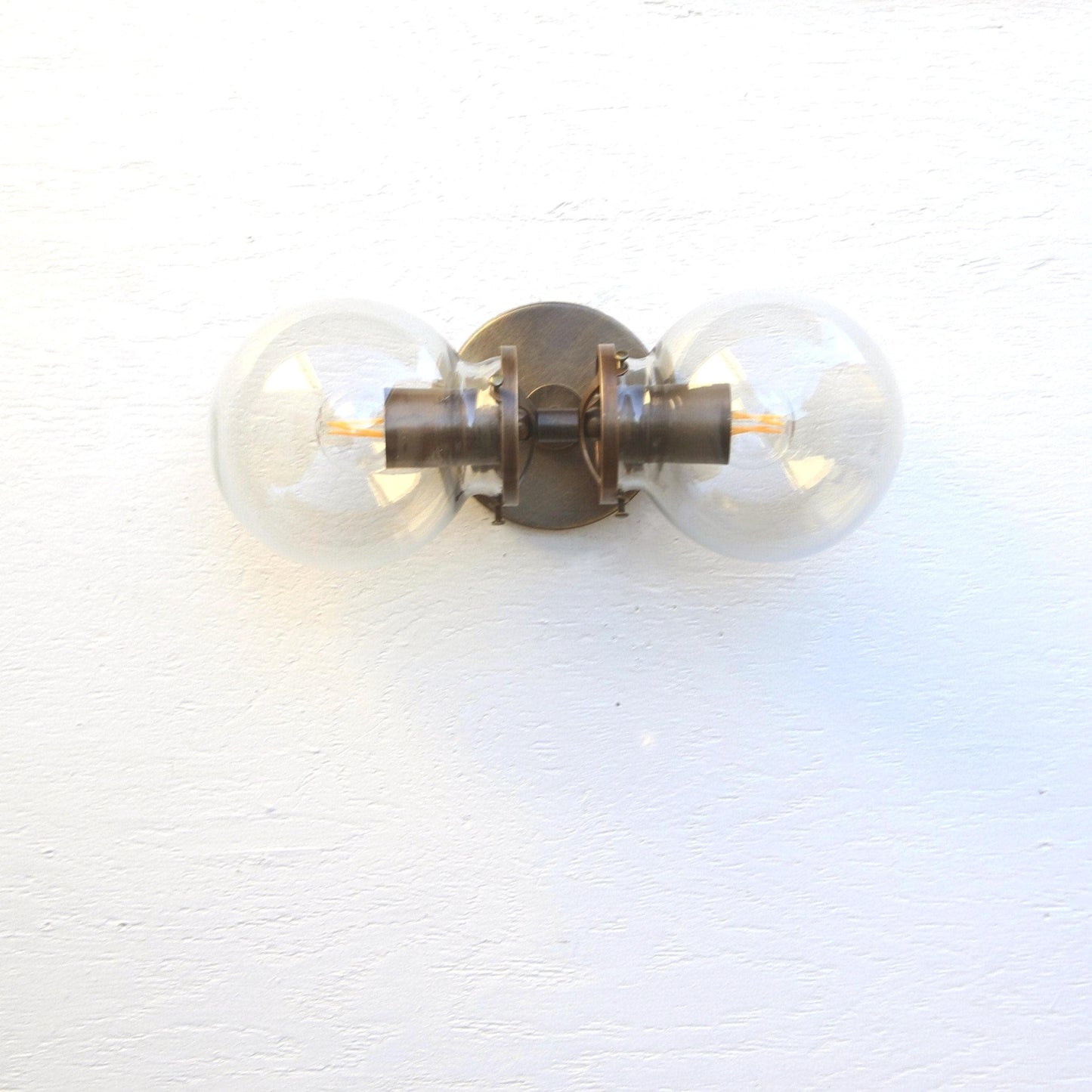 Two-Light Clear Glass Globe Vanity Wall Sconce