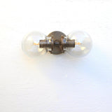 Two-Light Clear Glass Globe Vanity Wall Sconce