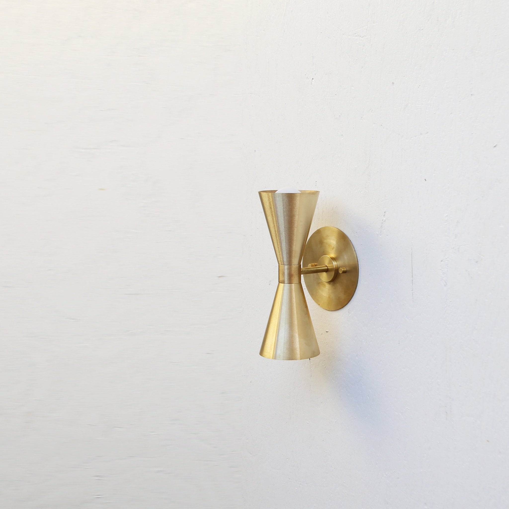 Two-Light Double Cone Wall Sconce in Solid Brass
