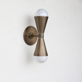 Two-Light Double Cone Wall Sconce in Solid Brass