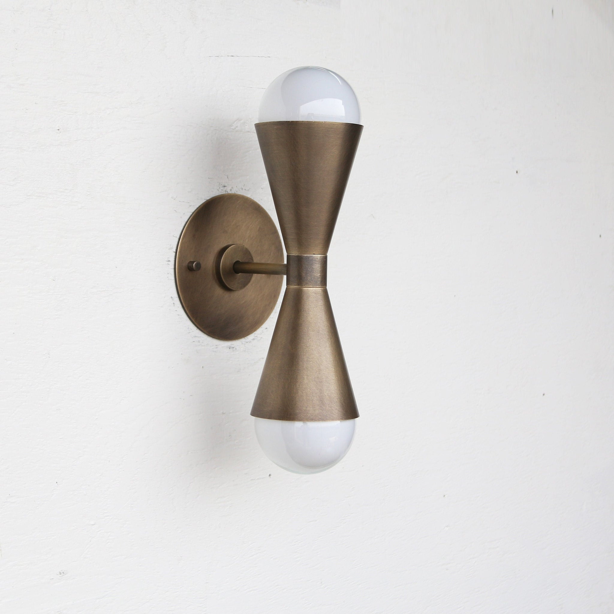 Two-Light Double Cone Wall Sconce in Solid Brass