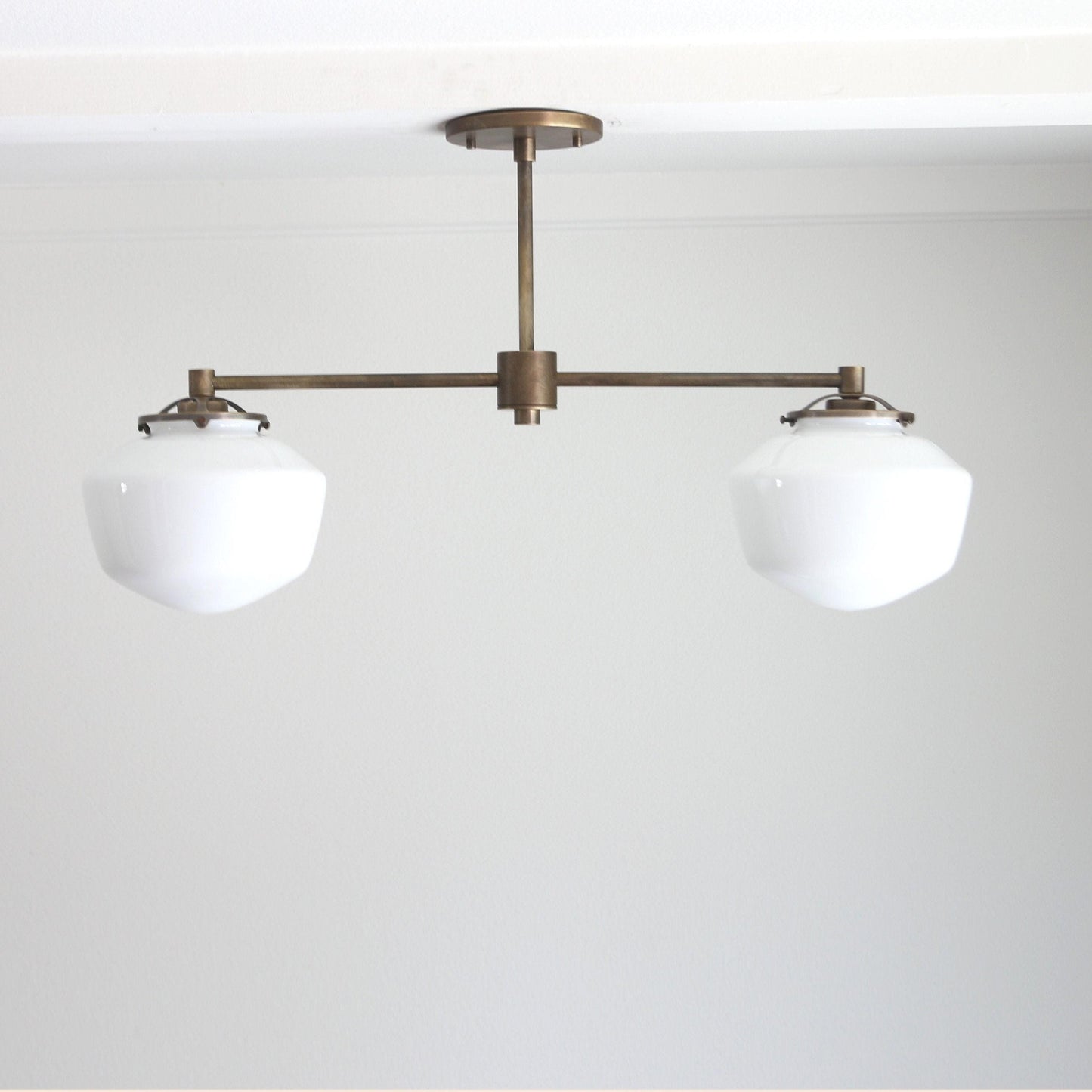 Two-Light Linear Chandelier with Schoolhouse Glass Shades