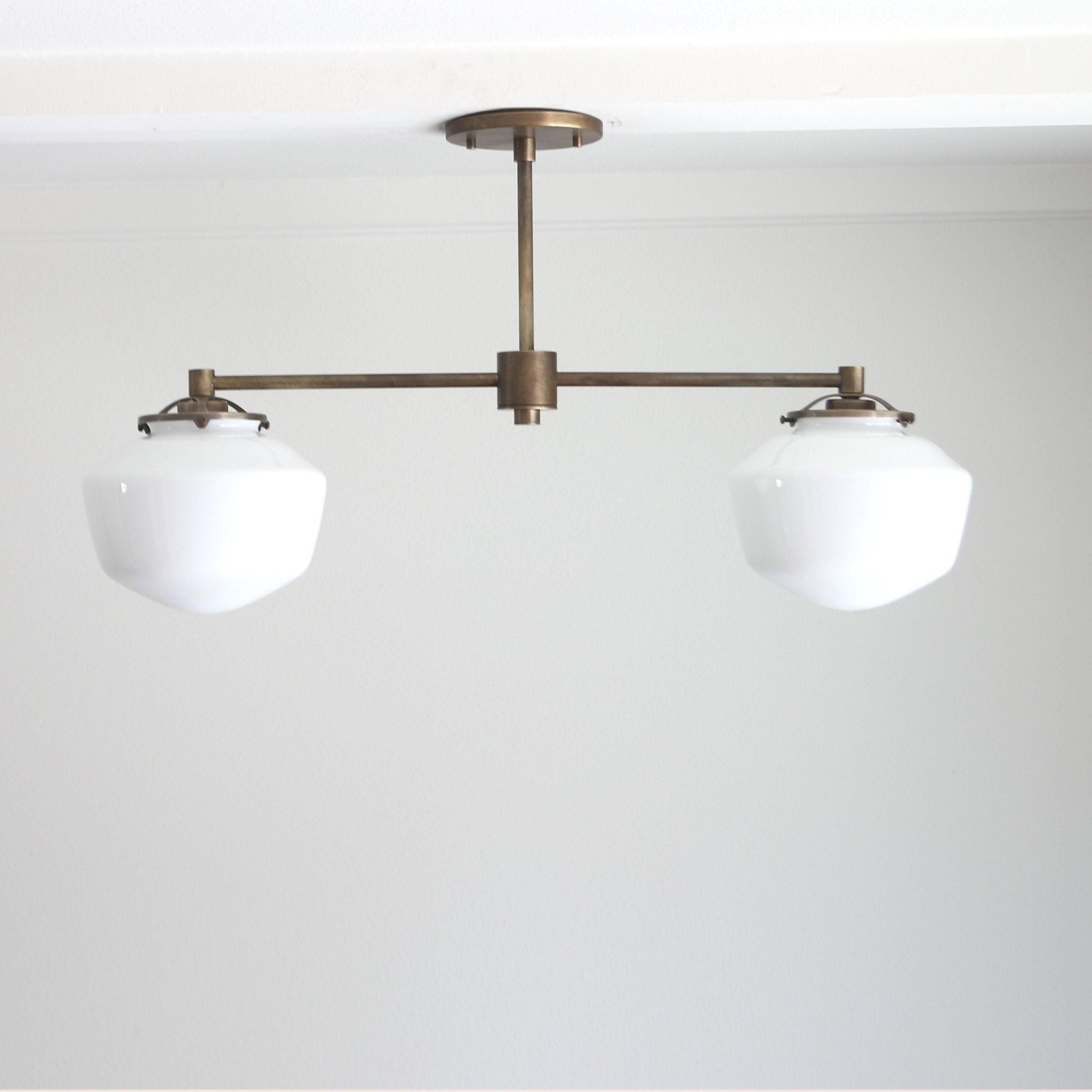 Two-Light Linear Chandelier with Schoolhouse Glass Shades