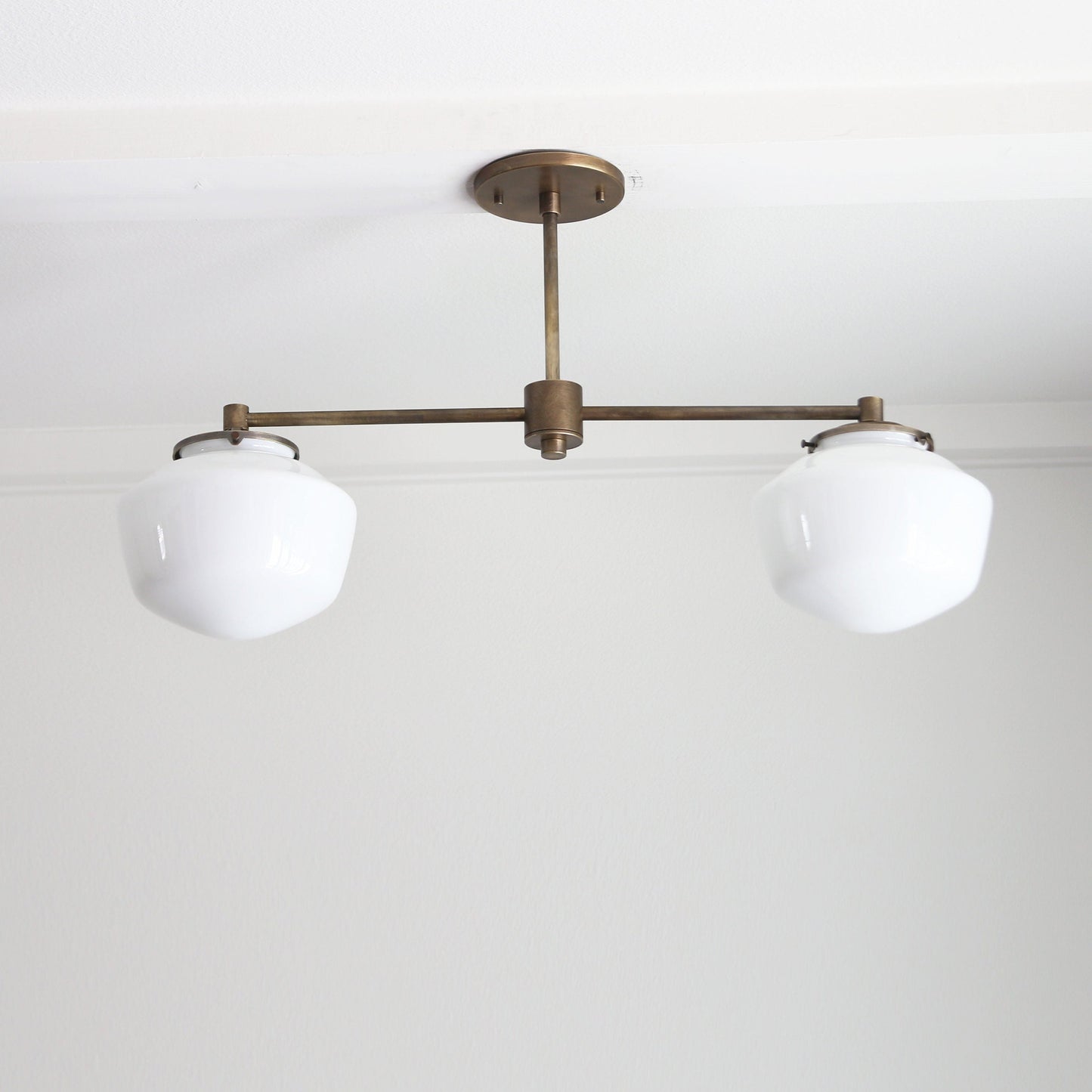 Two-Light Linear Chandelier with Schoolhouse Glass Shades