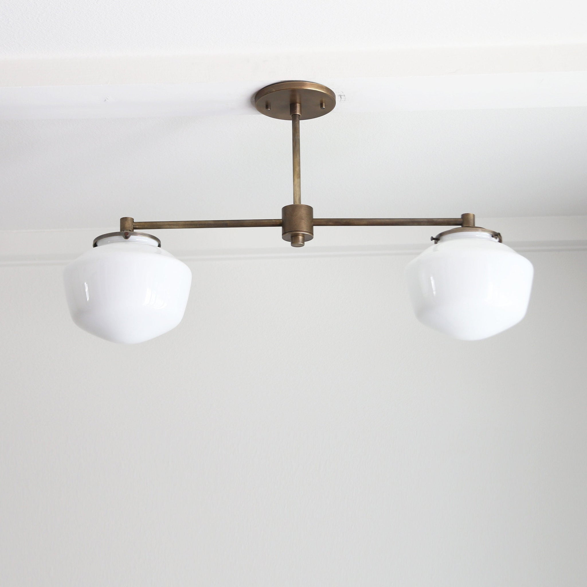 Two-Light Linear Chandelier with Schoolhouse Glass Shades