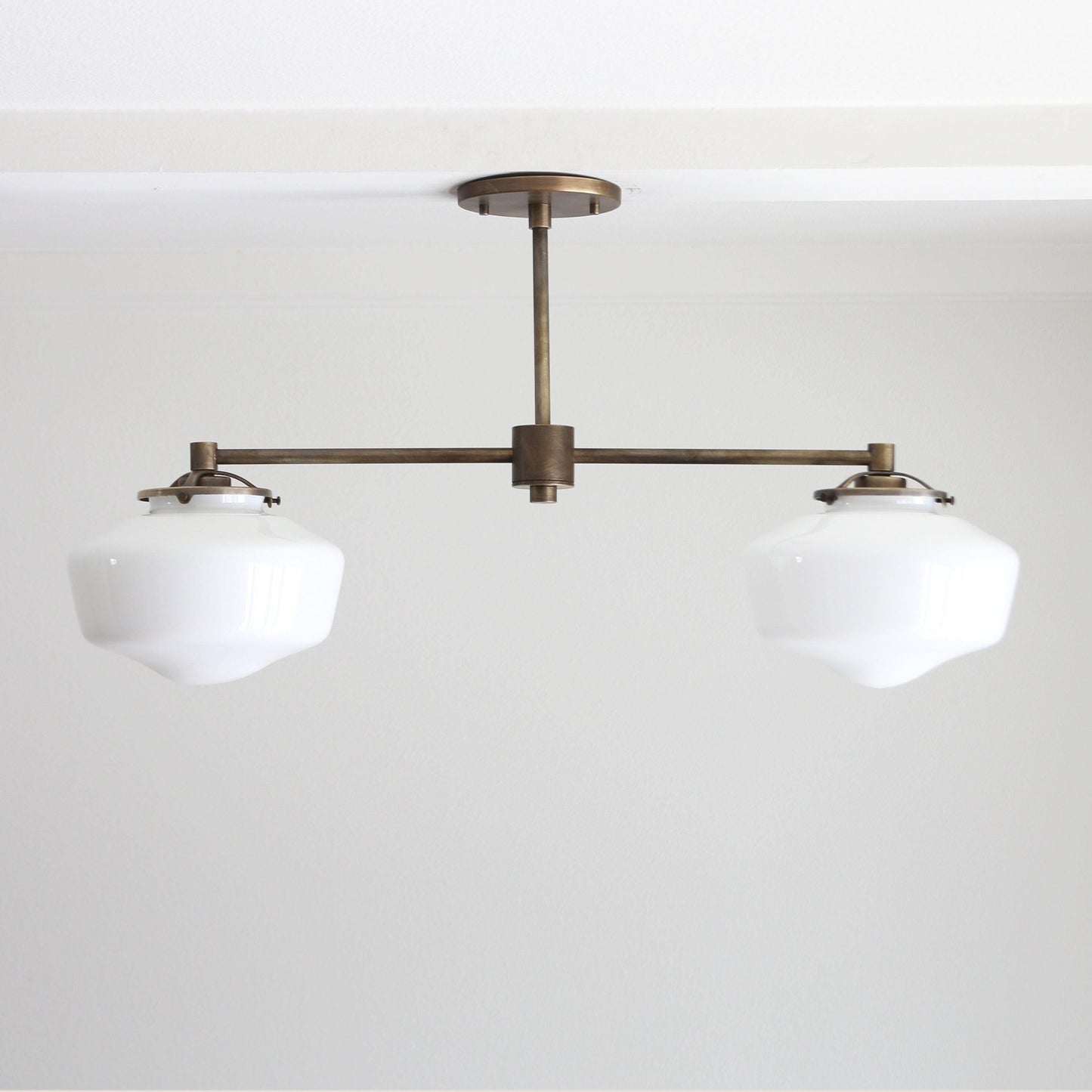 Two-Light Linear Chandelier with Schoolhouse Glass Shades