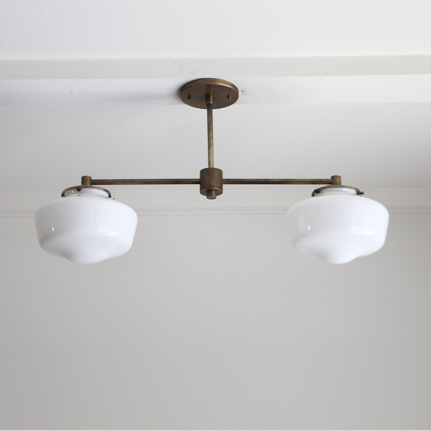 Two-Light Linear Chandelier with Schoolhouse Glass Shades