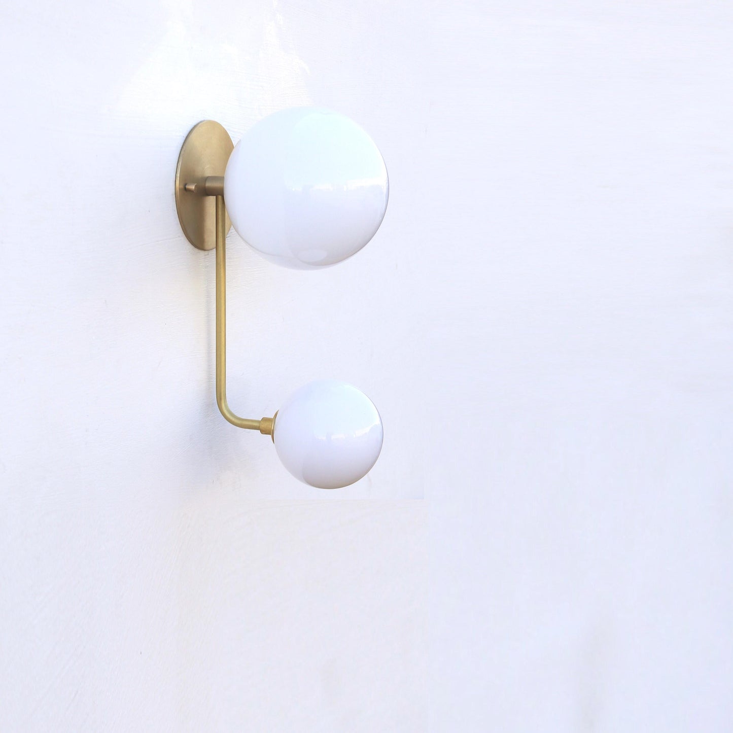 Two-Light Offset Globe Wall Sconce