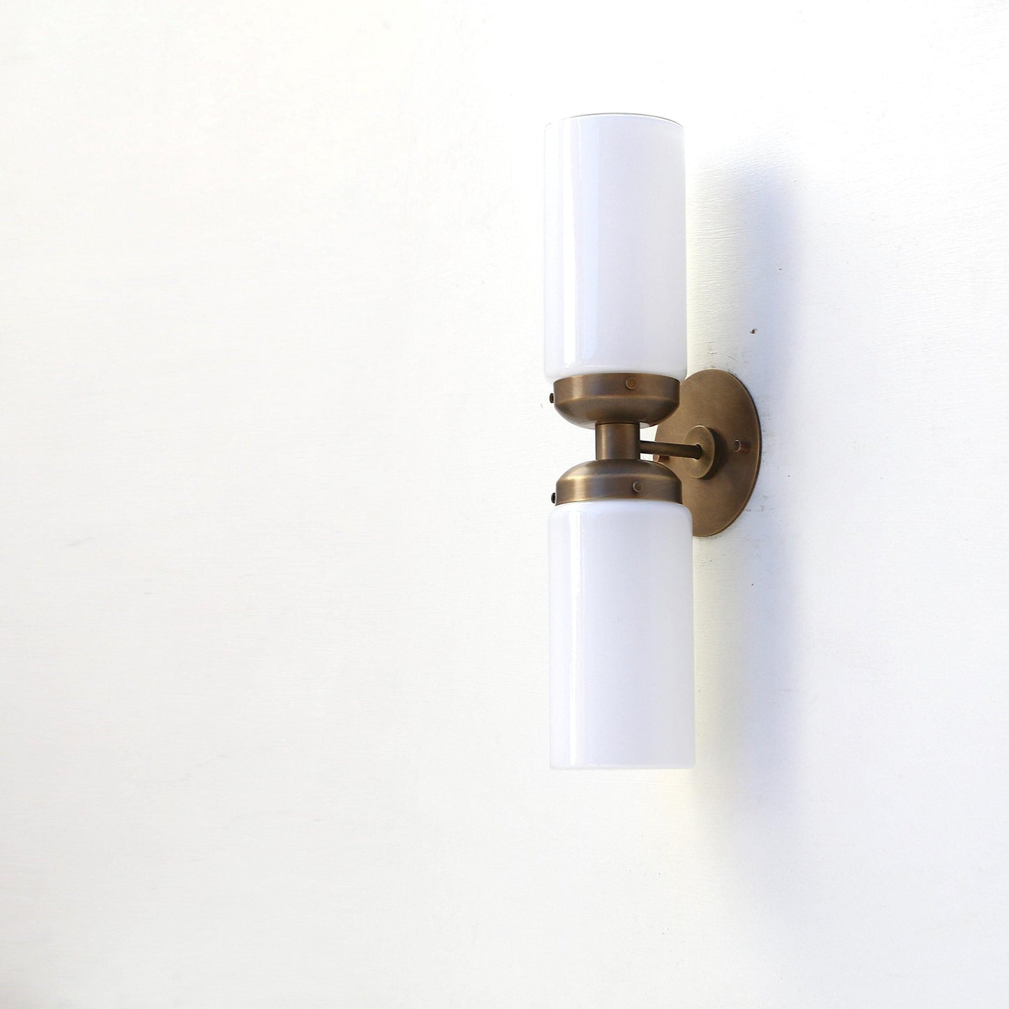 Two-Light Opal Glass Cylinder Vanity Wall Sconce