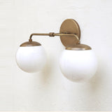 Two-Light Opal Globe Bathroom Vanity Wall Sconce