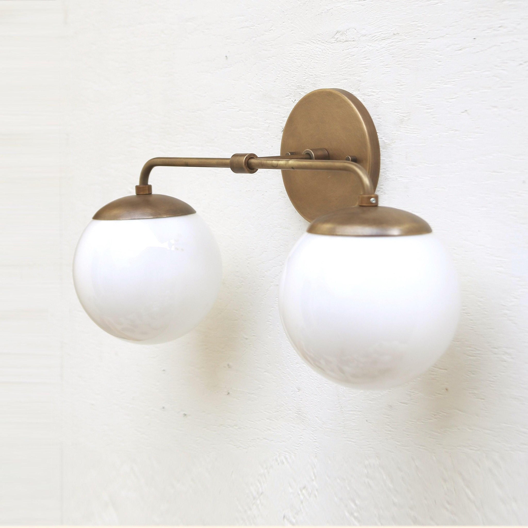 Two-Light Opal Globe Bathroom Vanity Wall Sconce