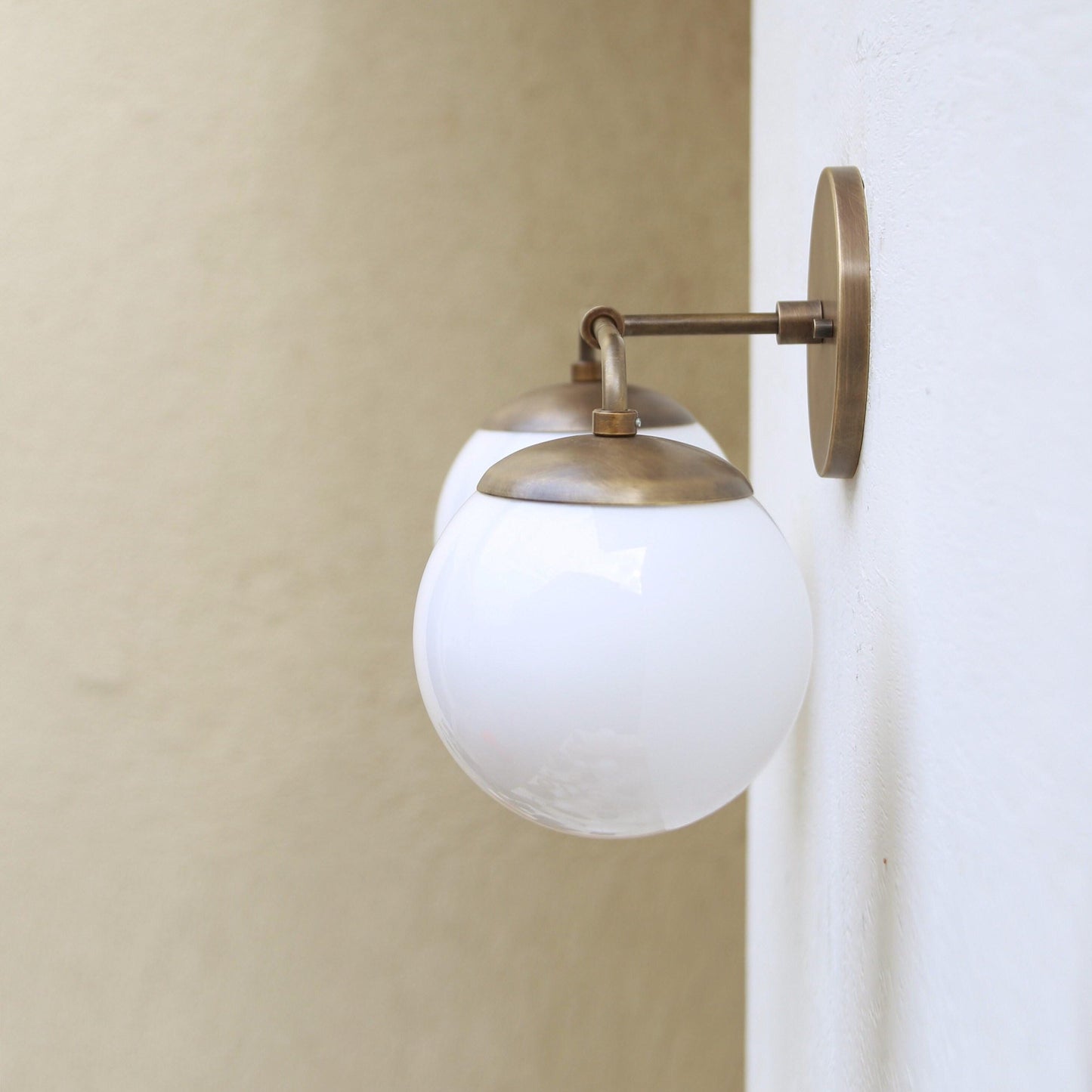 Two-Light Opal Globe Bathroom Vanity Wall Sconce