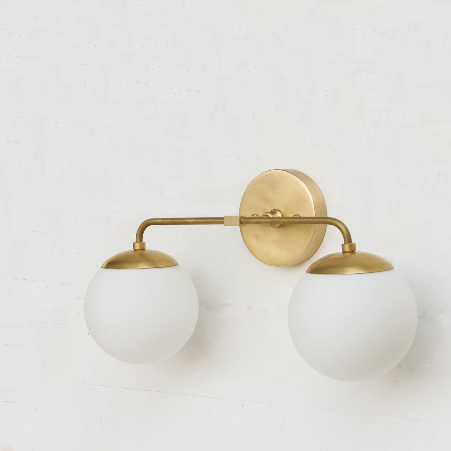 Two-Light Opal Globe Bathroom Vanity Wall Sconce